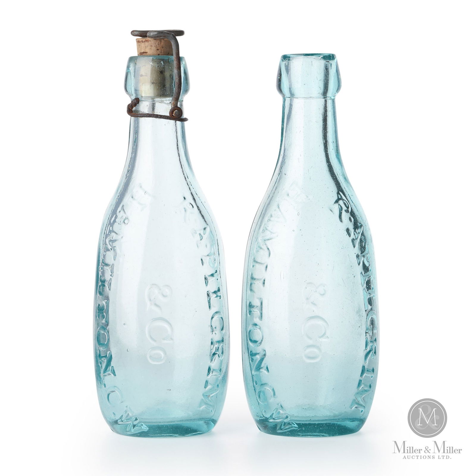 R.A. Pilgrim & Co. Hamilton, C.W. Soda Water Bottles: Canadian. 1880s. Glass. 7" x 2.5" x 2.5" each. From the William Robert Wilson Collection.