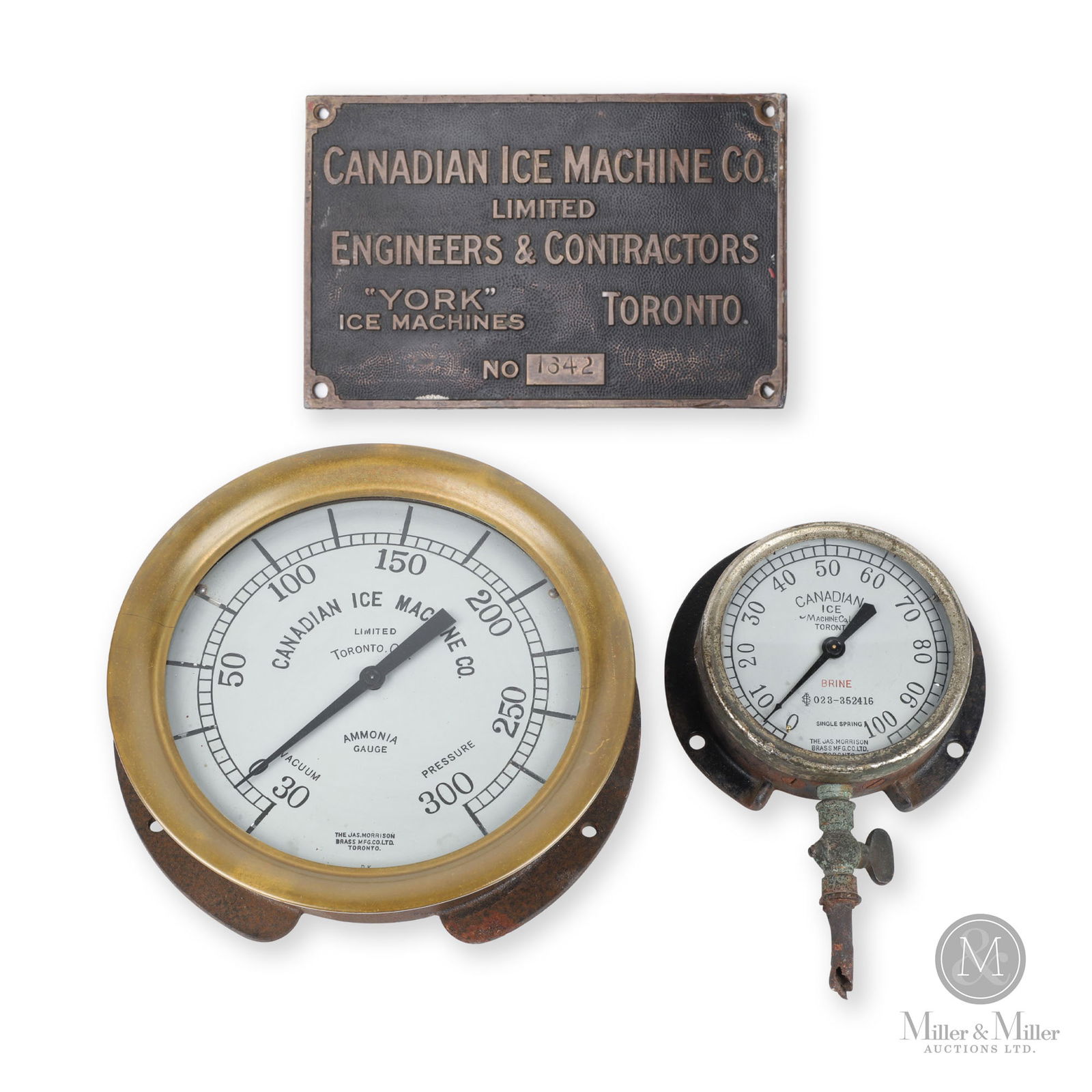 Canadian Ice Machine Co. Ammonia Gauge & Plaque: Canadian. 1920s. Cast iron cases and plaque. Gauge: 5.5" Dia x 2". Plaque: 5" x 8" x 0.12". From the William Robert Wilson Collection.
