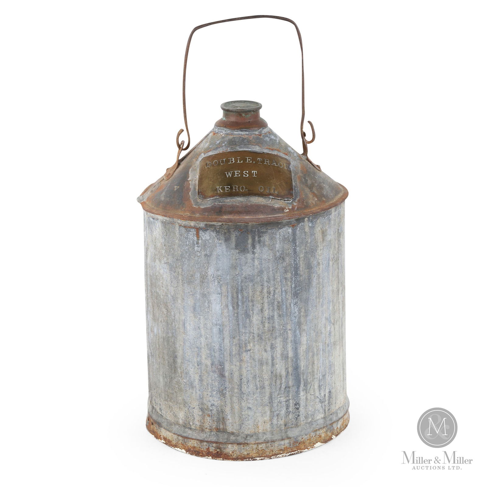 Double Track West Bulk Kerosene Oil Container: Canadian. 1920s. Galvanized steel with applied brass tag. 17" x 10.75" x 10.75". From the William Robert Wilson Collection.
