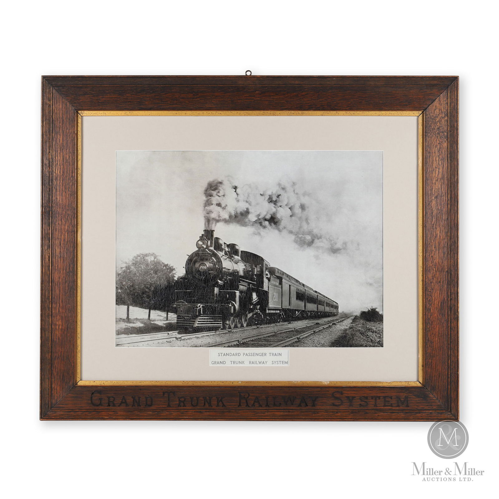 Grand Trunk Railway Standard Passenger Train Photograph: Canadian. 1920s. Photograph, matted and framed. Framed: 28" x 34" x 1". From the William Robert Wilson Collection.