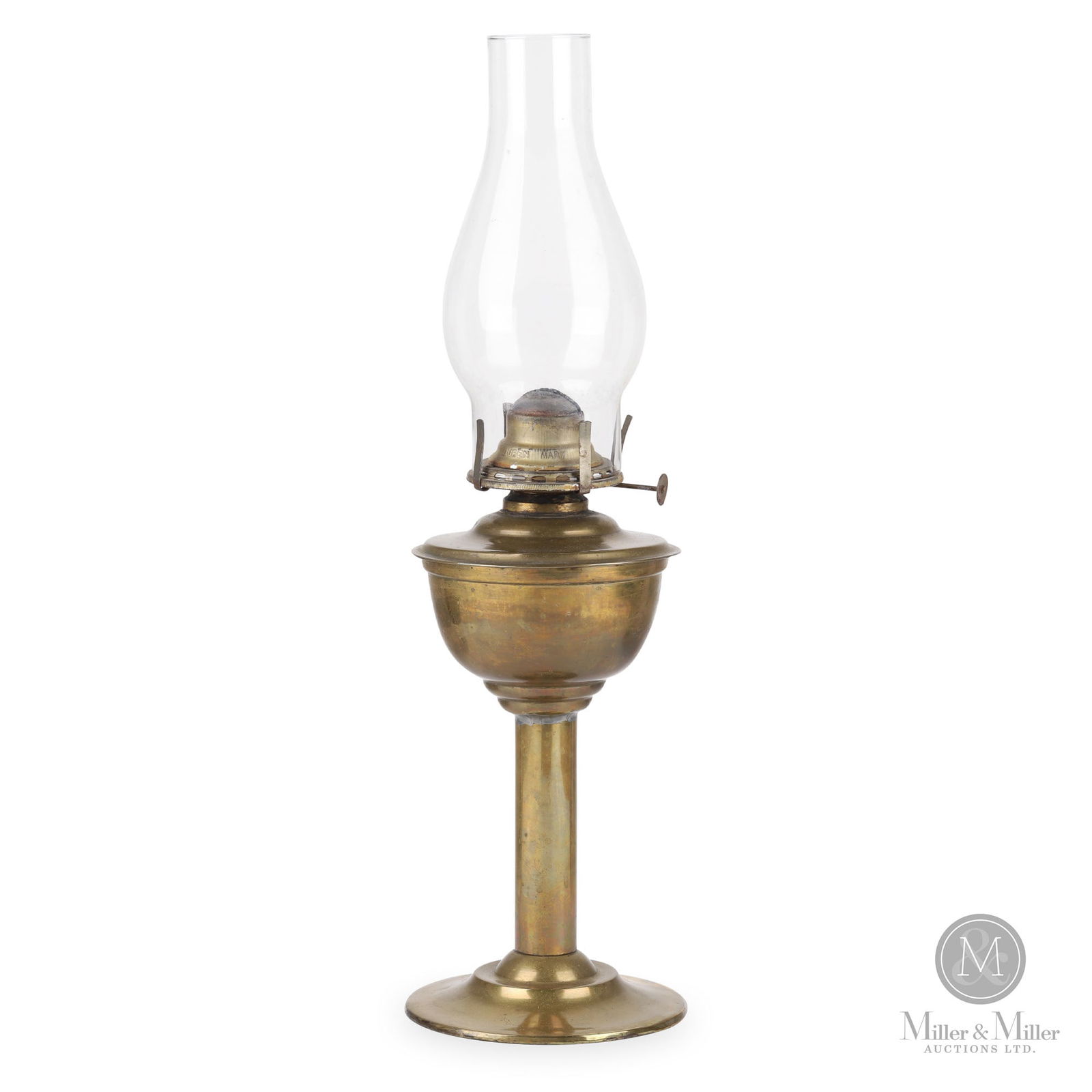 H.L. Piper Grand Trunk Railway Station Desk Lamp: Canadian. 1910s. Brass with glass chimney. Marked, "HL Piper Montreal" and "G.T.R", on top of fount. 12" x 5.5" x 5.5" (not including chimney). From the William Robert Wilson Collection.