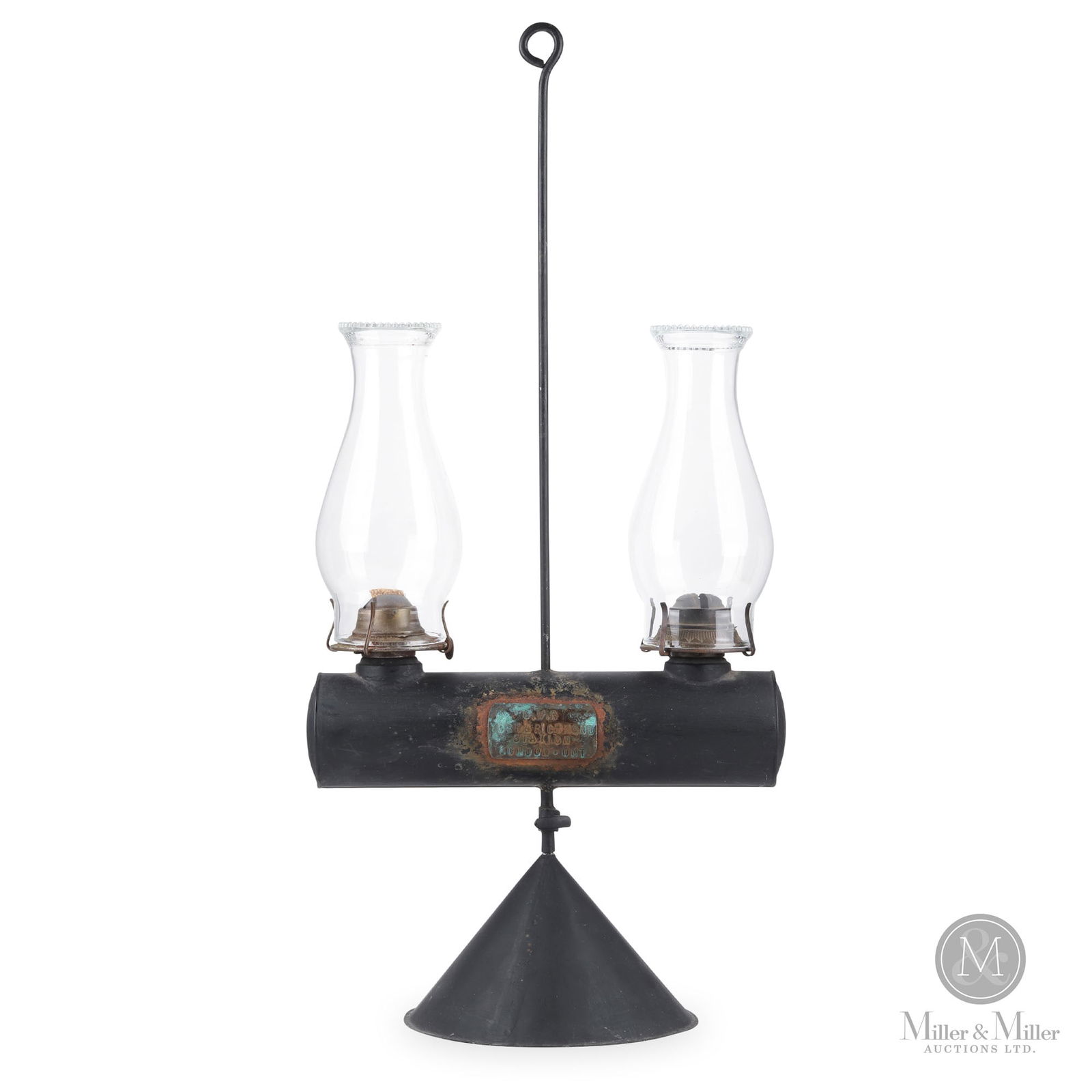 Great Western Railway York & Richmond Station Lamp: Canadian. 1880s. Steel base and fount. Glass chimneys. Tagged, "G.W.R York & Richmond Station London. ONT", center of fount. 26.5" x 12.5" x 7.5". From the William Robert Wilson Collection.