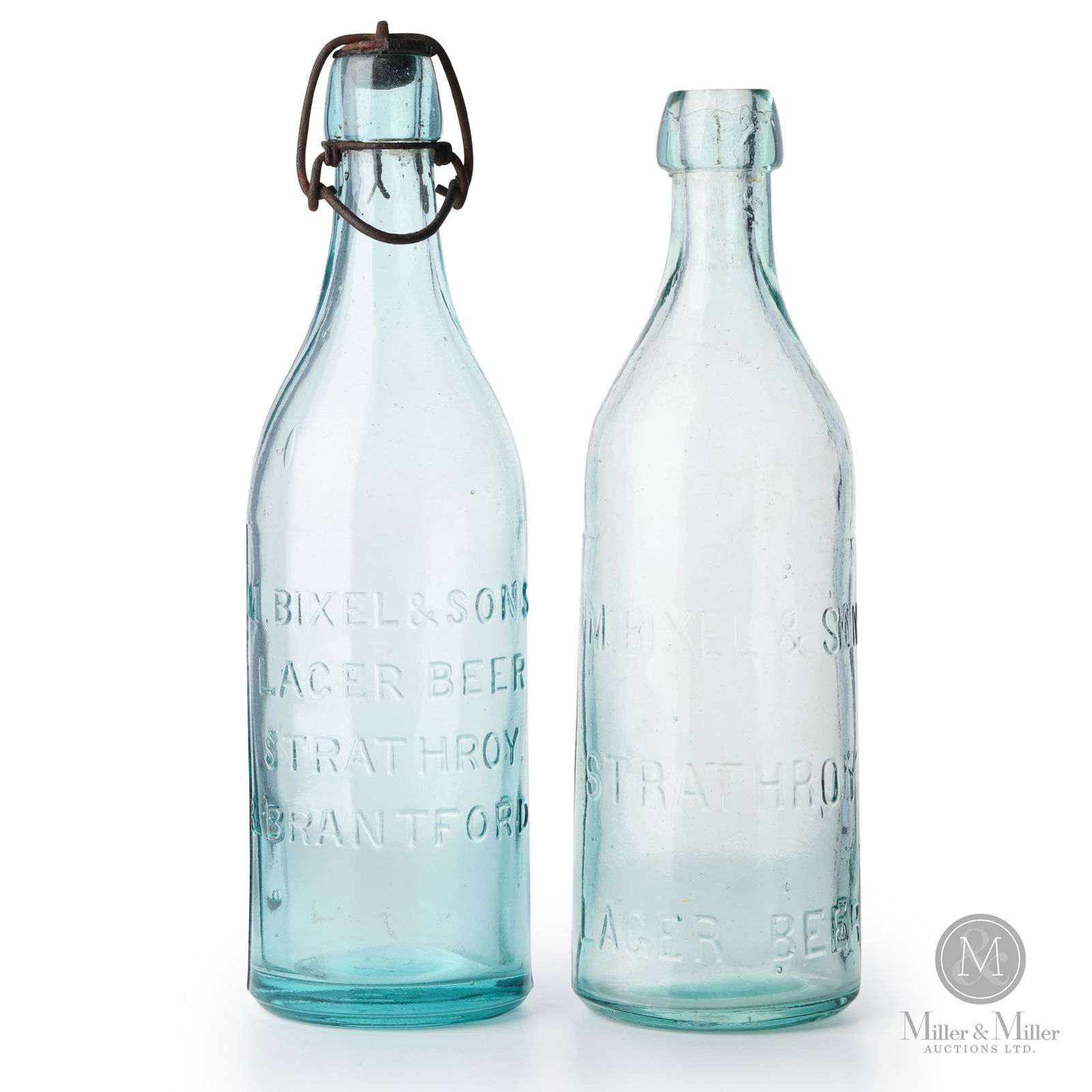 M. Bixel & Son Brewery Strathroy and Branford, Ontario Beer Bottles: Canadian. 1890s. Glass. 9.25" x 2.75" x 2.75" and 9.5" x 2.75" x 2.75". From the William Robert Wilson Collection.