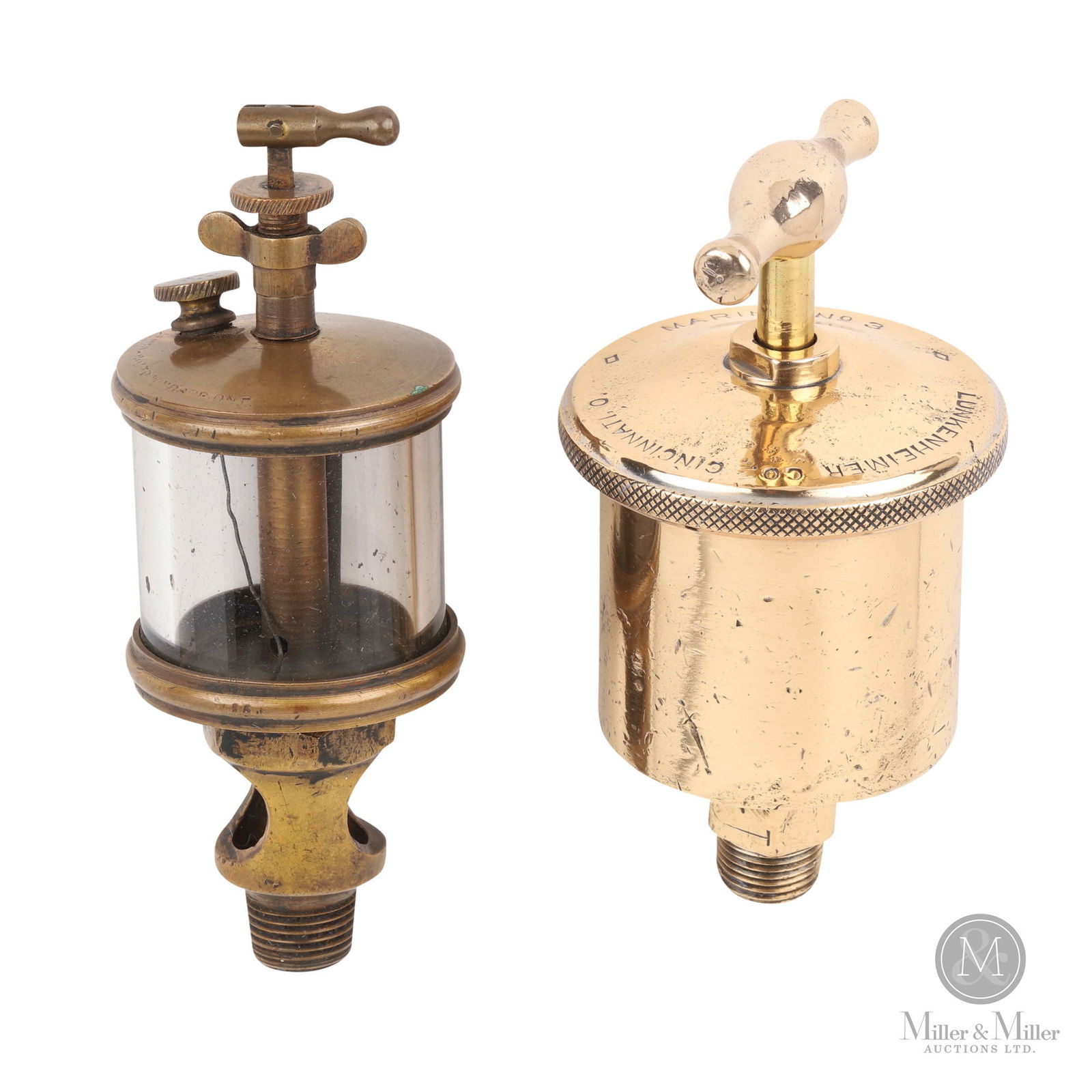 Steam Engine Grease Cup & Drip Feed Oiler: American. 1910s. Brass, glass. Marked, "Lunkenheimer Co. Cincinnati Marine No. 3", on one. 6" x 3.25" and 6.5" x 2.5". From the William Robert Wilson Collection.