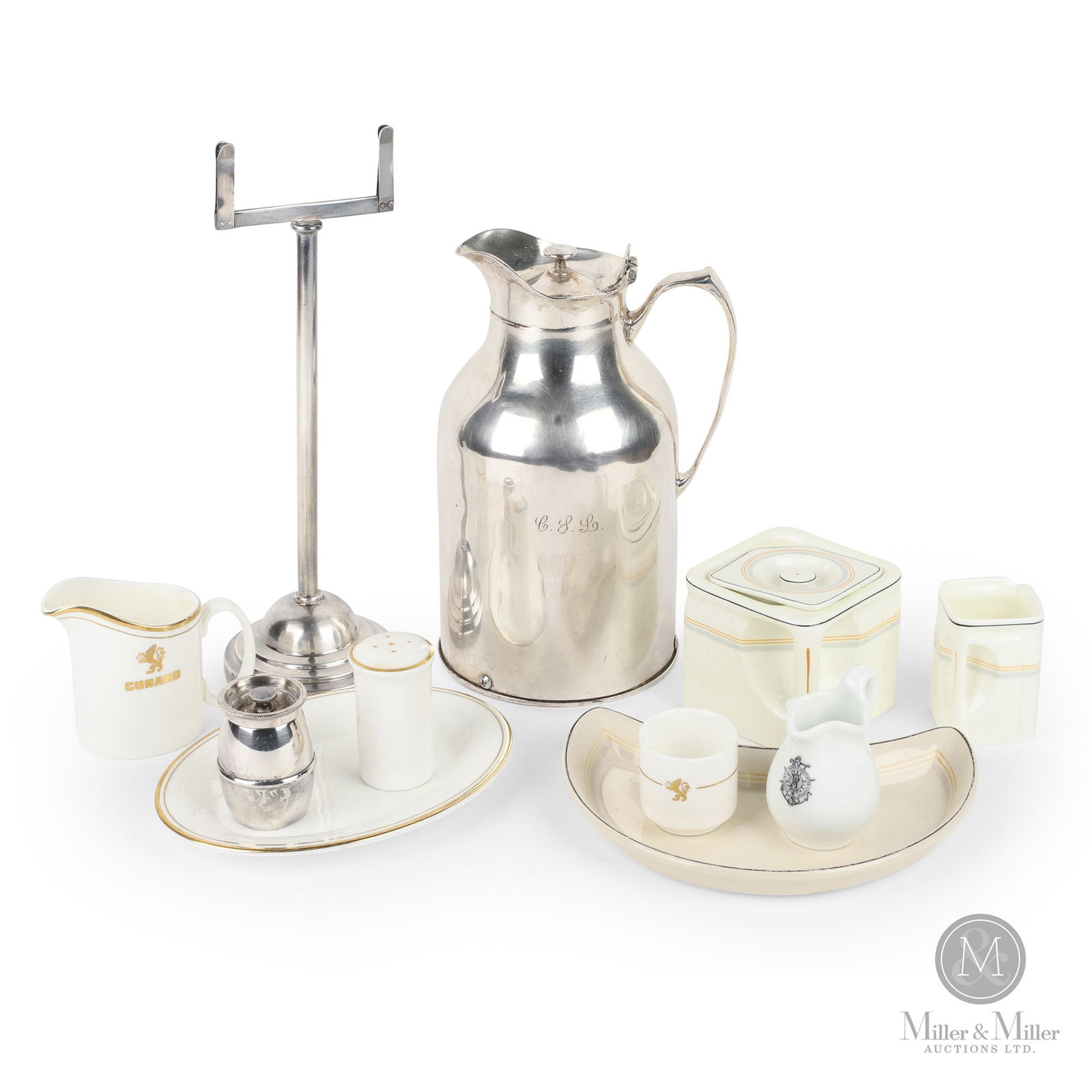 Steamship Ware & Silverware: Early 20th Century. Porcelain. Silverware. Includes: square teapot, square creamer, two creamers, salt shaker, egg cup, small oval, half moon bone plate, silver pepper grinder, large silver thermos, a