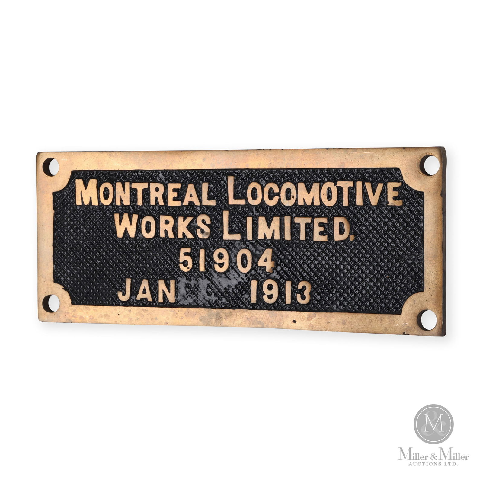 Montreal Locomotive Works 1913 Builder's Plate No. 51904: Canadian. 1913. Cast brass, painted. 3.5" x 9" x 0.25". From the William Robert Wilson Collection.