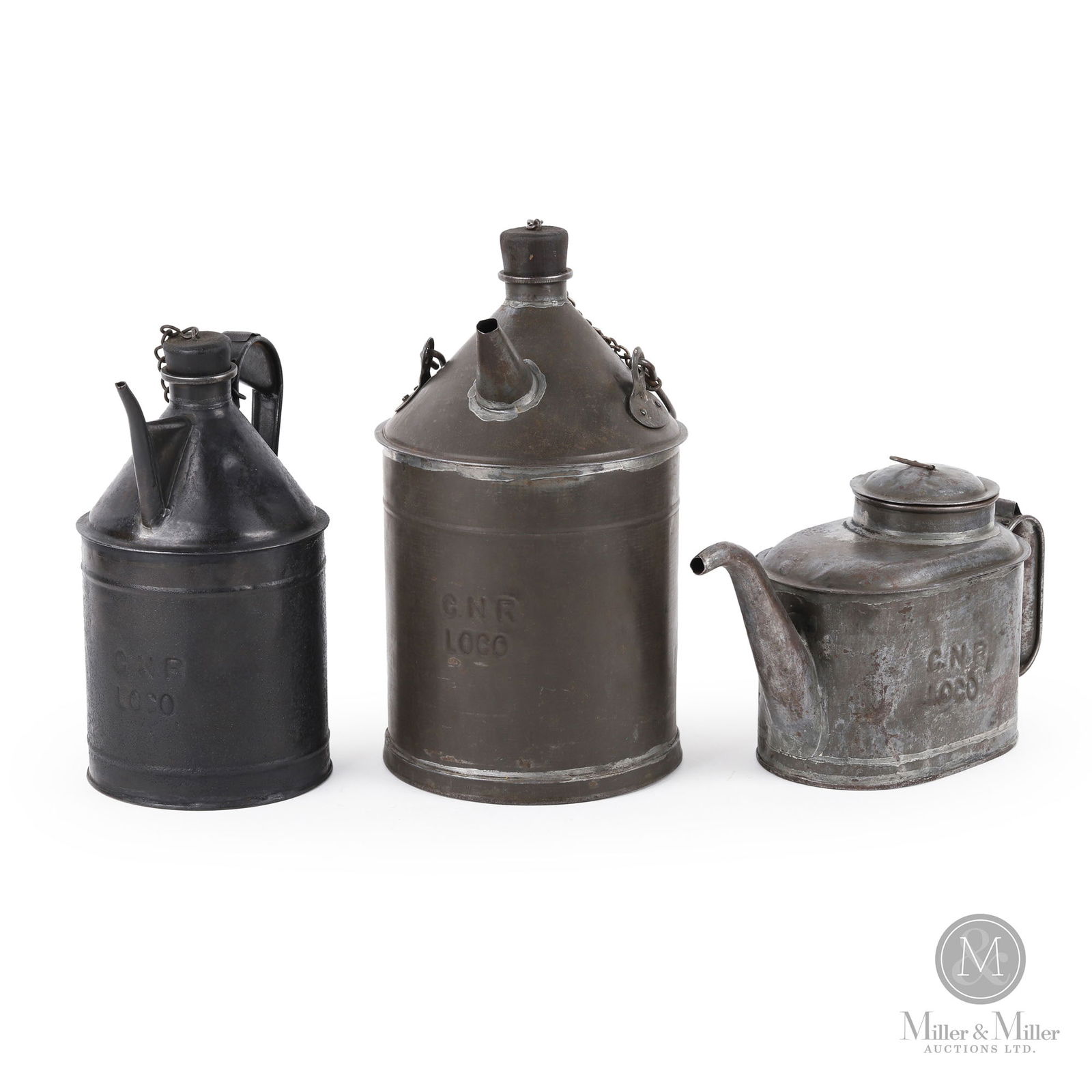 Canadian Northern Railway Locomotive Oil Cans: Canadian. 1920s. Metal. Embossed, "C.N.R Loco", on mid-center of each. Range of heights from 6.75" to 12". From the William Robert Wilson Collection.