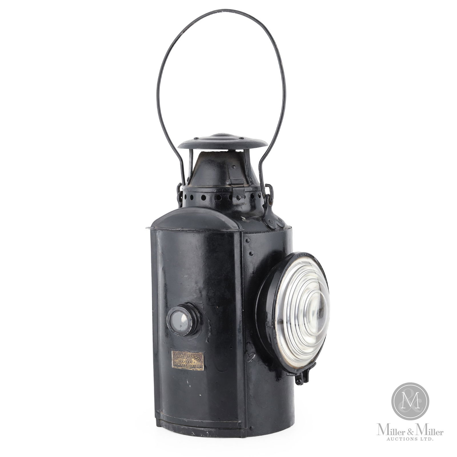 H.L. Piper Railway Lantern: Canadian. 1930s. Metal frame, embossed glass globe. Tagged, "Hiram Piper Co. Limited", on frame. Marked, "Montreal", on the outside of case. 13.5" x 6.25" x 6.25". From the William Robert Wilson Colle