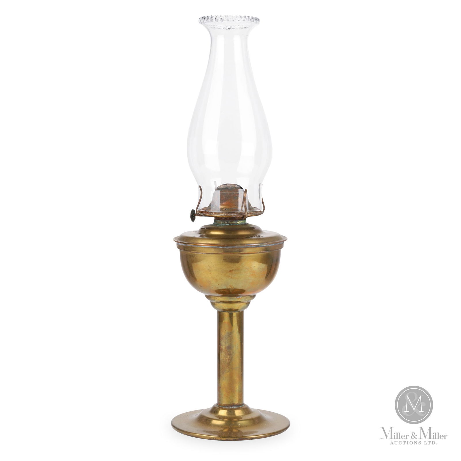 H.L. Piper CPR Station Desk Lamp: Canadian. 1910s. Brass with glass chimney. Marked, "HL Piper Montreal CPR", on the top of the fount. 12" x 5.5" x 5.5" (not including chimney). From the William Robert Wilson Collection.