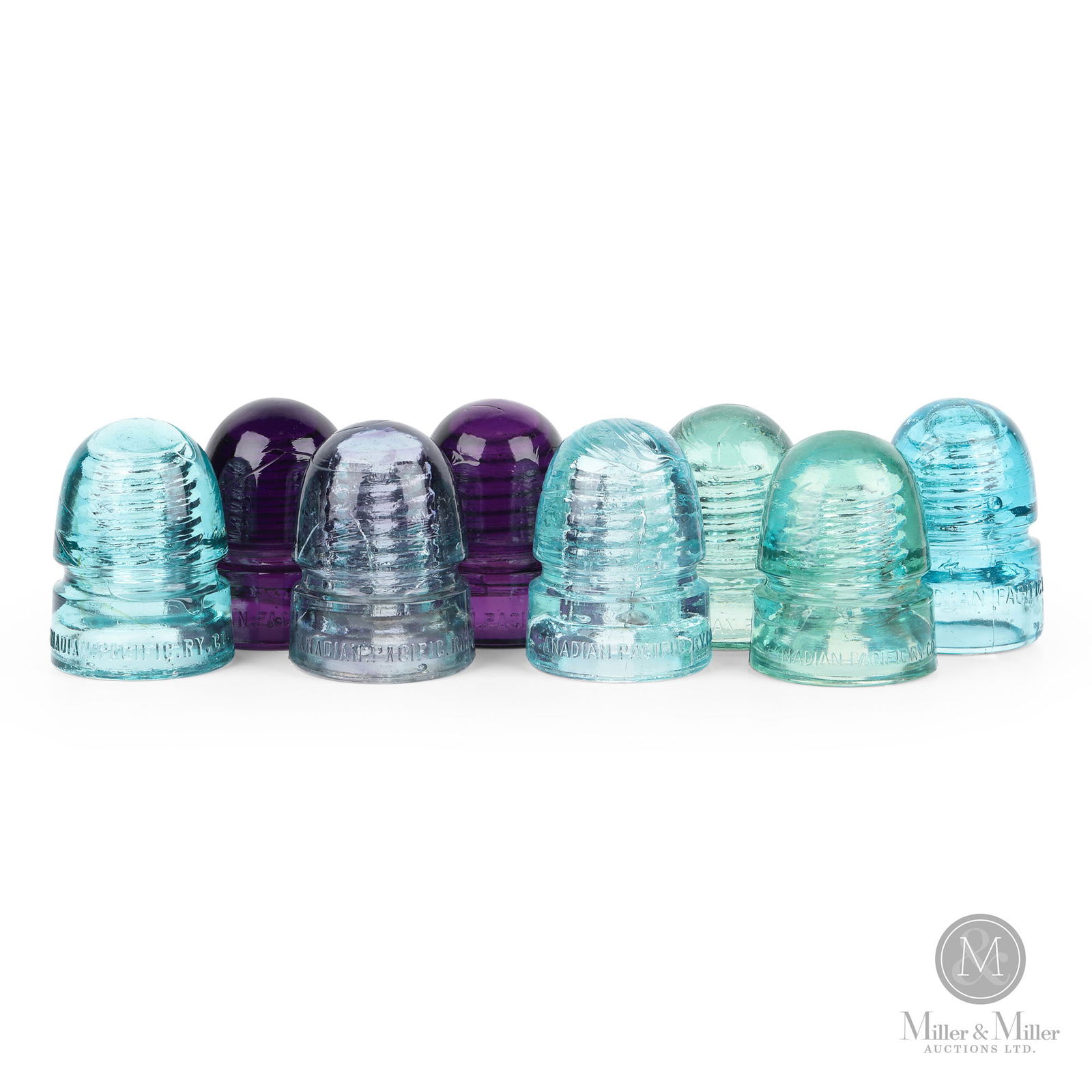 Canadian Pacific Railway CD143 Insulators: Canadian. 1910s. Glass. Stamped, "CPR.". 3.75" x 2.75" x 2.72". From the William Robert Wilson Collection.