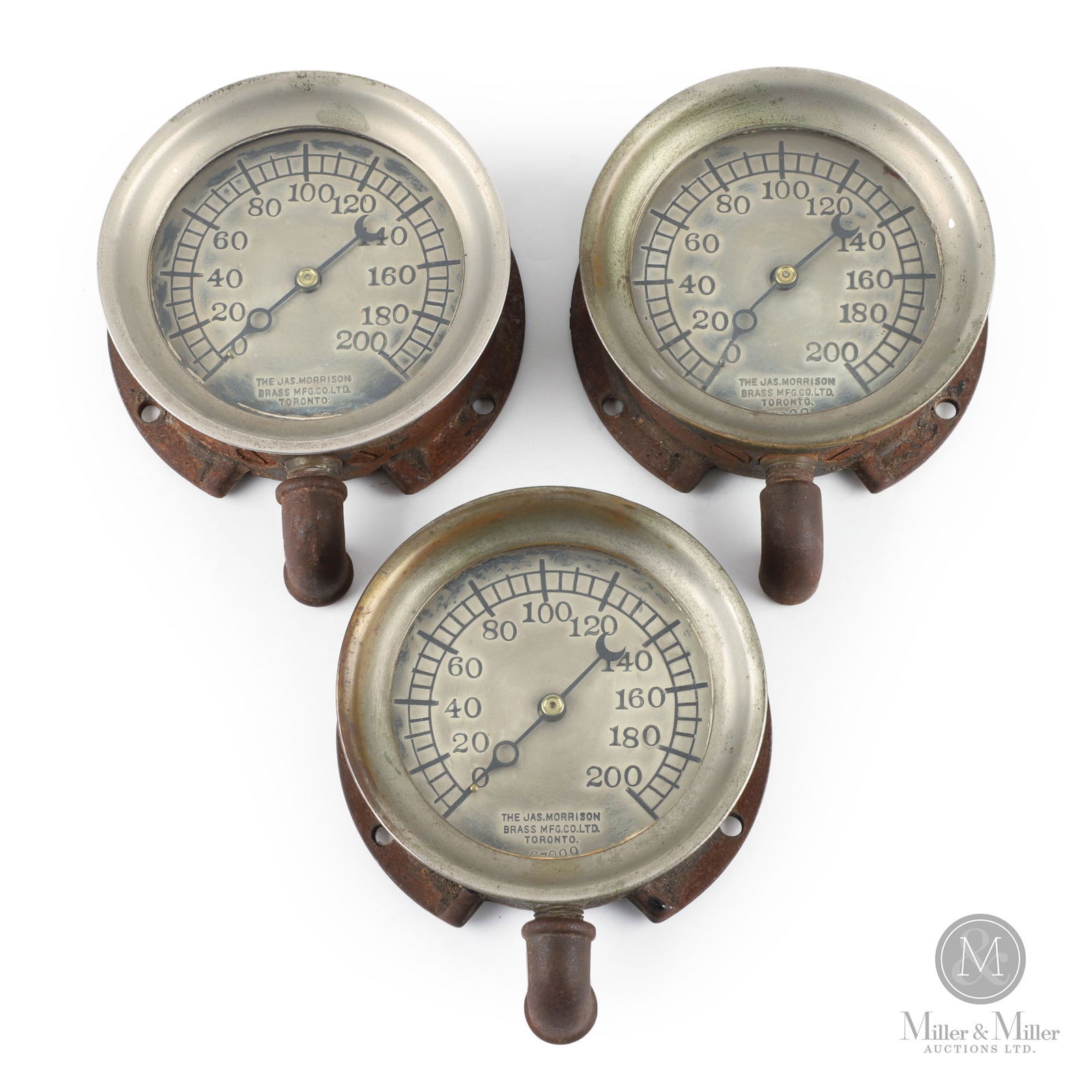 Morrison, Toronto Steam Gauges: Canadian. 1920s. Nickel plated brass bezels. Marked, "The Jas. Morrison Brass Mfg Co. Ltd Makers Toronto", on lower center dials. 3.5" dials. Overall: 5" x 5" x 2". From the William Robert Wilson Coll