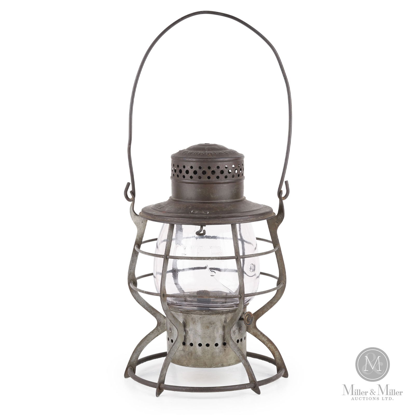 E.T. Wright Grand Trunk Railway Brakeman's Lantern: Canadian. 1910s. Metal frame, embossed glass globe. Marked, "G.T.R", on top of frame. Marked, "E.T.W & Co." and "GTR", on globe. 10.25" x 6.75" x 6.75". From the William Robert Wilson Collection.