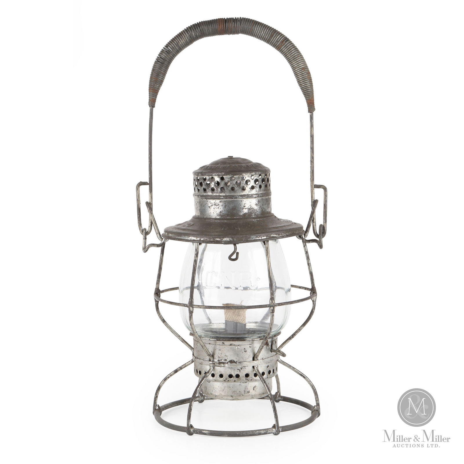 E.T. Wright GTR Brakeman's Lantern: Canadian. 1910s. Painted steel frame with embossed glass globe. Marked, "ET Wright and Co Mfrs. Hamilton-ONT Pat'd 1908" and "GTR", on frame. 10.5" x 7" x 7". From the William Robert Wilson Collection