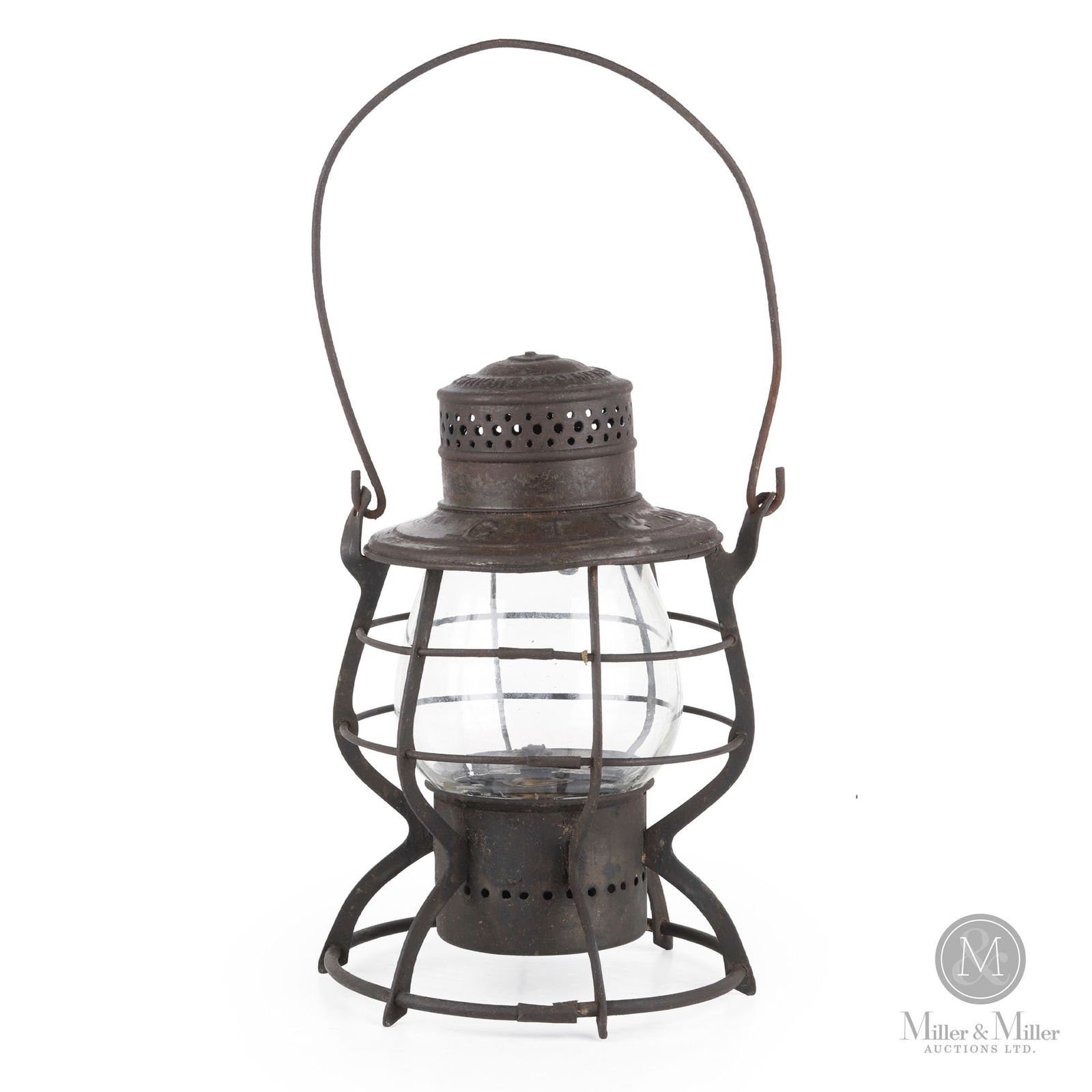 E.T. Wright Grand Trunk Pacific Brakeman's Lantern: Canadian. 1910s. Metal frame, embossed glass globe. Marked, "E.T. Wright & Co. Mfrs. Hamilton G.T.P Pat'd 1908", on frame. 10.25" x 7" x 7". From the William Robert Wilson Collection.