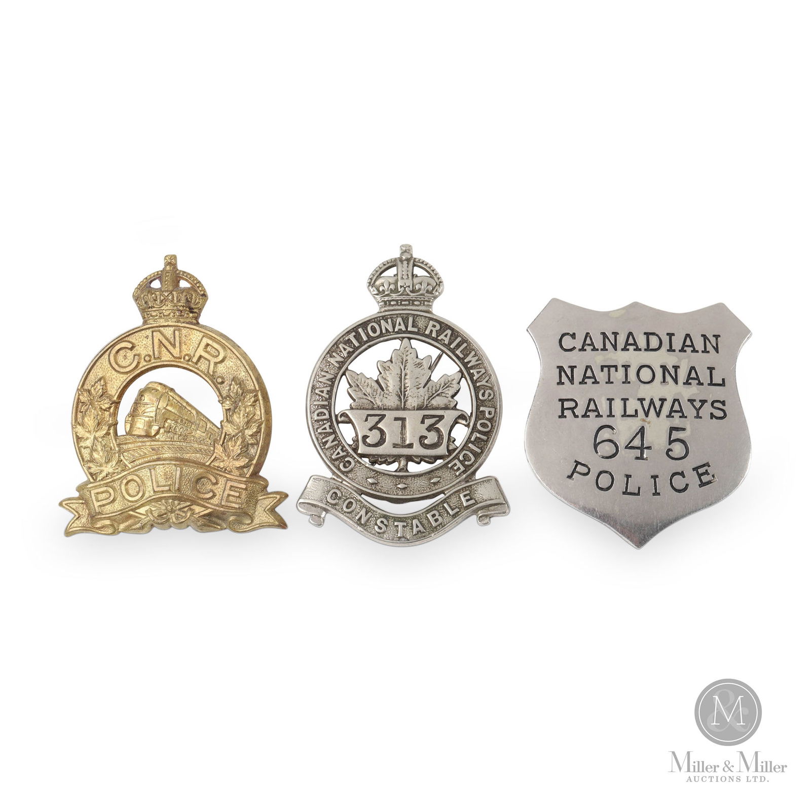 Canadian National Railways Police Badges: Canadian. 1920s, 1930s, and 1950s. Nickel plated. Embossed brass. 2.25" x 2", 2" x 1.75", and 1.5" x 1.5". From the William Robert Wilson Collection.