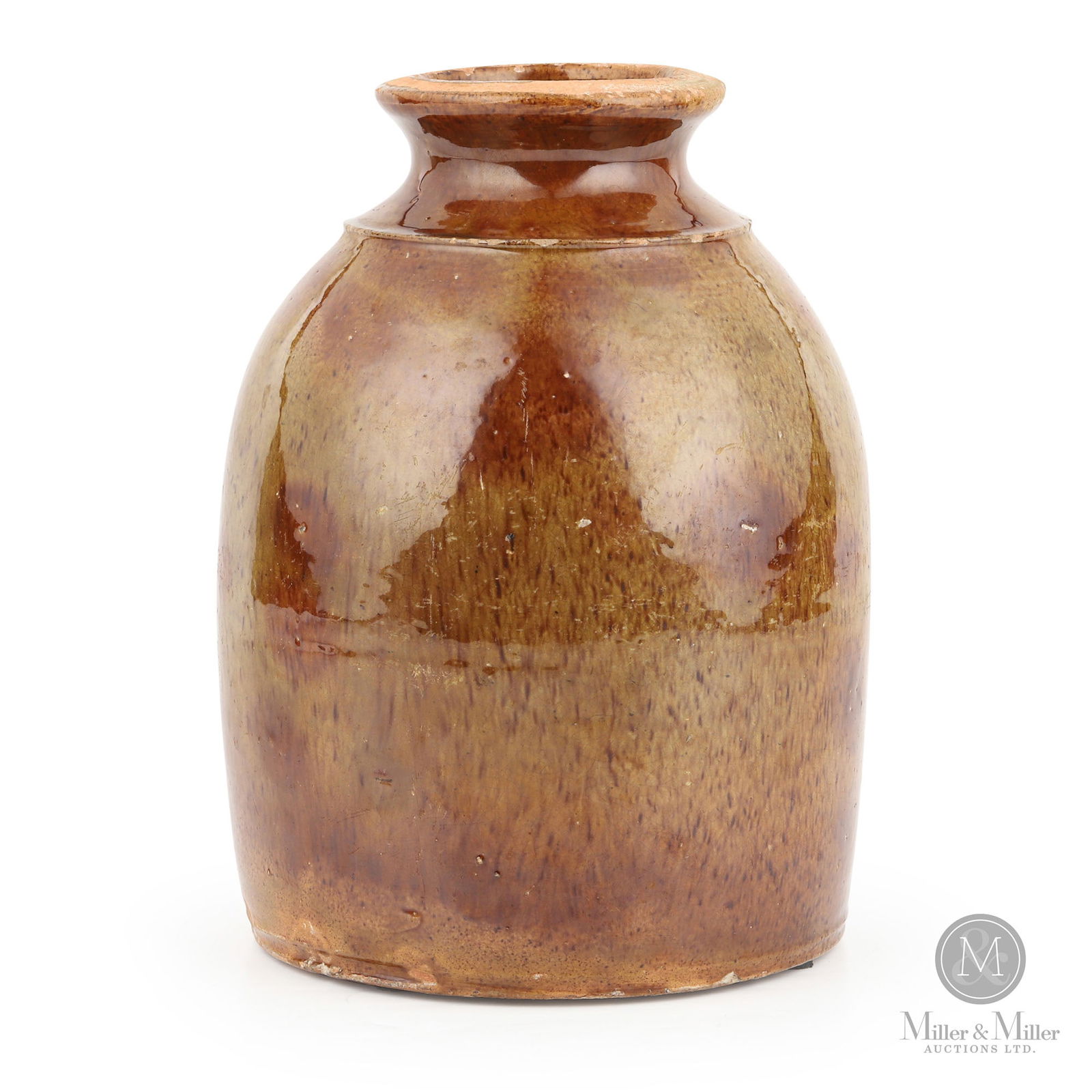 Western Ontario Half-Gallon Redware Jar with Pepper Glaze: Ontario. 1870s-1880s. Earthenware. A stunning green and brown mottled glaze with flecks of dark brown throughout. The form of this jar is consistent with the Holmesville Pottery (David Burns). 8.75" x