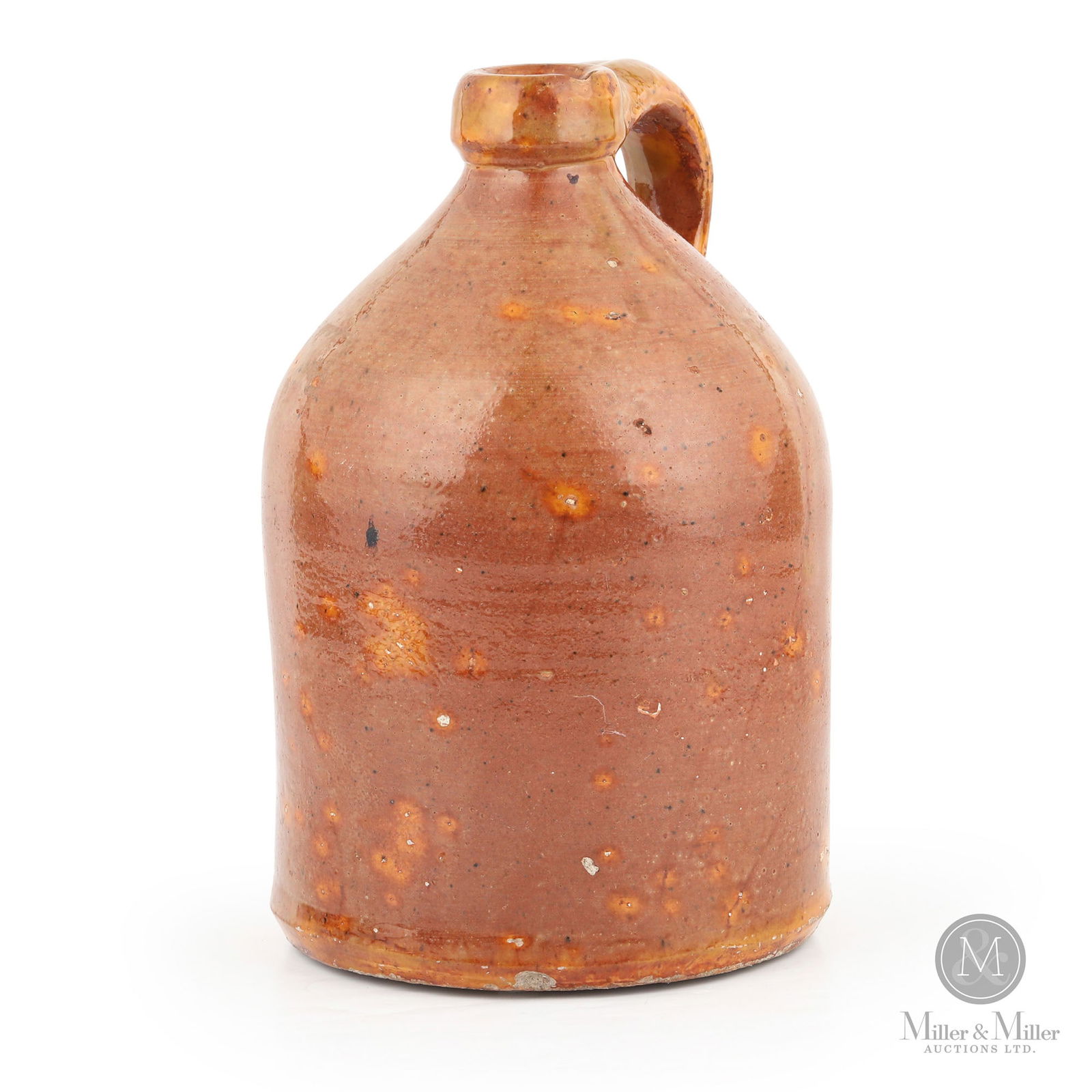 Aultsville Half-Gallon Redware Jug: Aultsville, Ontario. 1860s-1870s. Earthenware. Outstanding multi-coloured glaze accented with veining. Attributed to the Aultsville Potteries based on matching sherds discovered at the former site. Ex