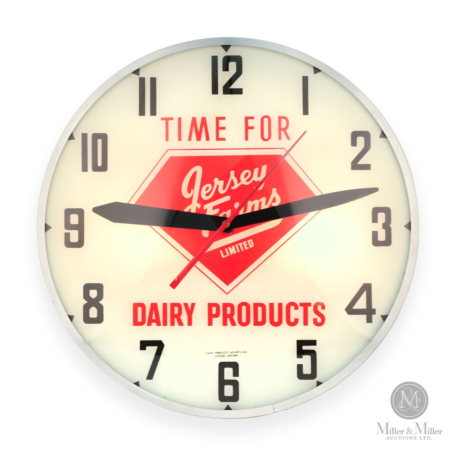 Jersey Farms Dairy Products Lighted Clock: Canadian. 1950s. Glass, metal. Marked, "Dairy Products Advertising, Weston, Ontario", above 6 on dial and reverse. 16.5" x 16.5" x 4". From the Al Bensmiller Collection.