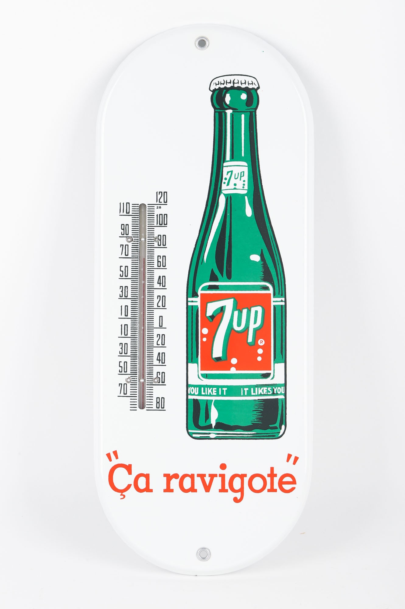 7-up Porcelain Thermometer Bilingual: French Canadian. 1950s. Porcelain. Bilingual version. 15" x 6" x .5".