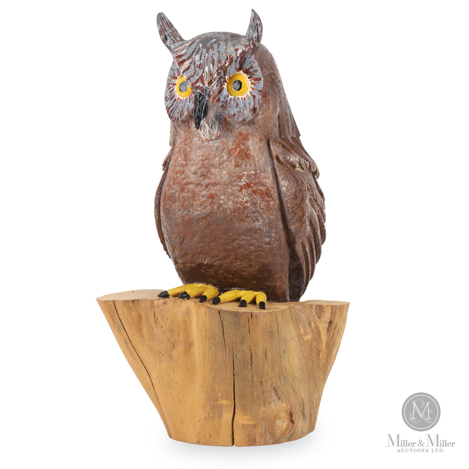 Brown and Grey Owl by Jean Claude Labrecque: Vallee-Jonction, Quebec. Last quarter 20th century. Carved and painted wood. An impressive and commanding great horned owl by noted Quebec carver Jean-Claude Labrecque. Signed, on bottom. 12.5" x 7.25