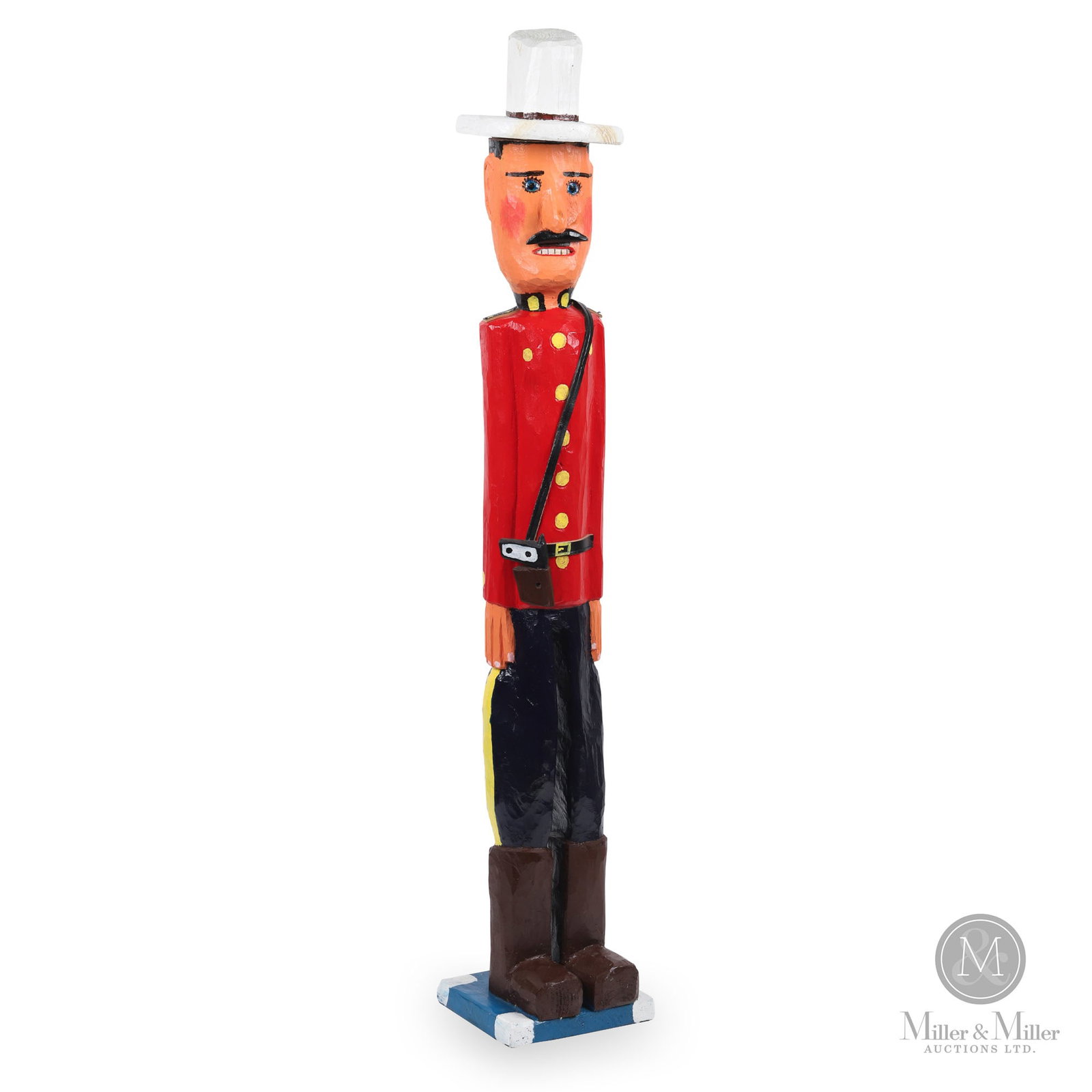 Mountie by Bradford Naugler: Lunenburg County, Nova Scotia. 2007. Carved and painted wood with leather strap. A very upright and militarily correct Mountie by Bradford Naugler. Bradford Naugler is well-known and documented for hi