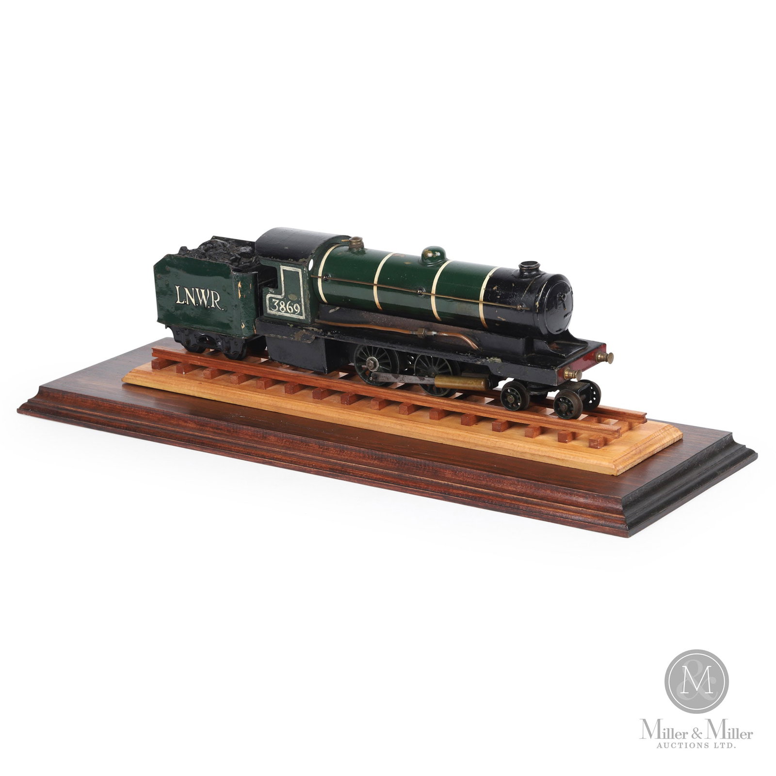 Bowman Models Live Steam 4-4-0 Locomotive & Tender: English. 1930s. Painted metal with brass. Unmarked. 17" x 3" x 4.5", Case 24" x 8" x 7.5" From the Phil Barnett Collection.