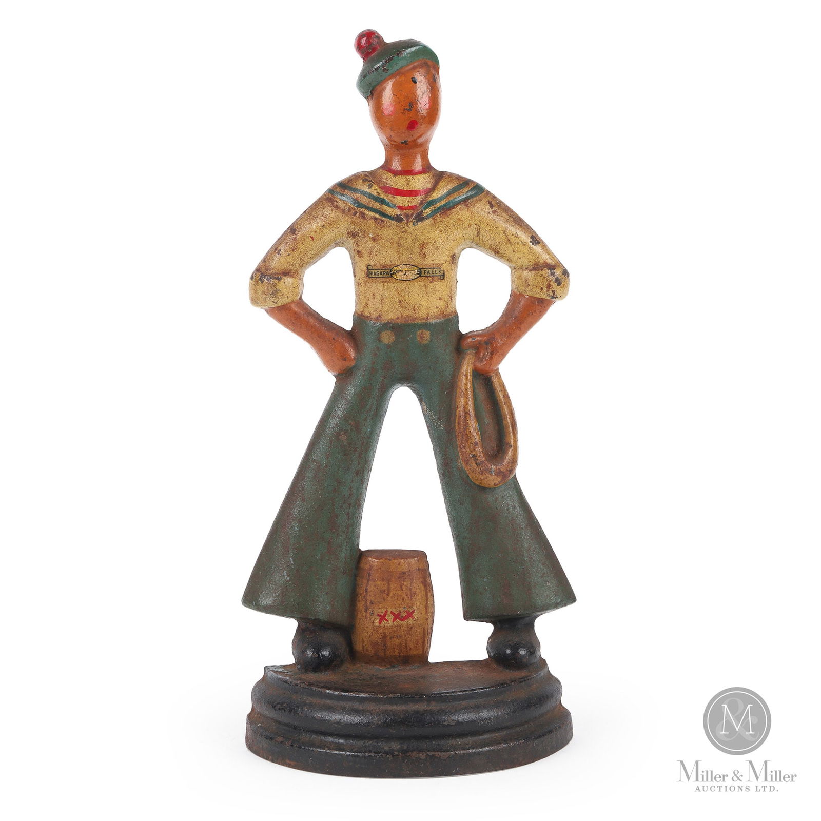Littco Products Sailor With Hands On Hips Doorstop: American. 1930s. Cast iron. Littco Products were known for making decorative cast iron products including doorstops. The sailor with hands on hips is on the list of known doorstops made by Littco. The