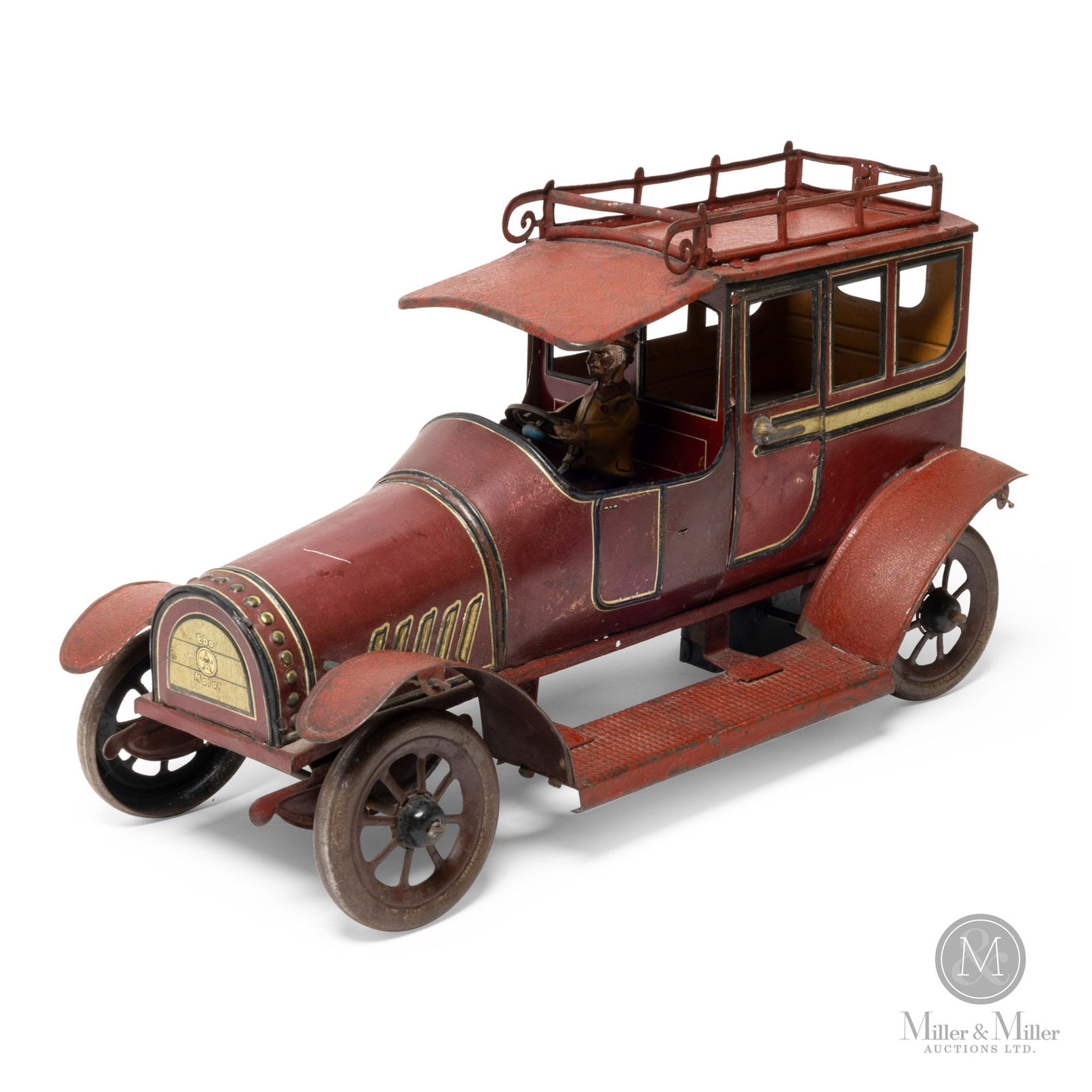 Hans Eberl EBO Toys Limousine: German. 1910s. Painted tinplate. Hans Eberl was one of the many German toymakers who produced quality toys. His company, EBO Toys, was in business for a very short period of time (1910-1920) making th