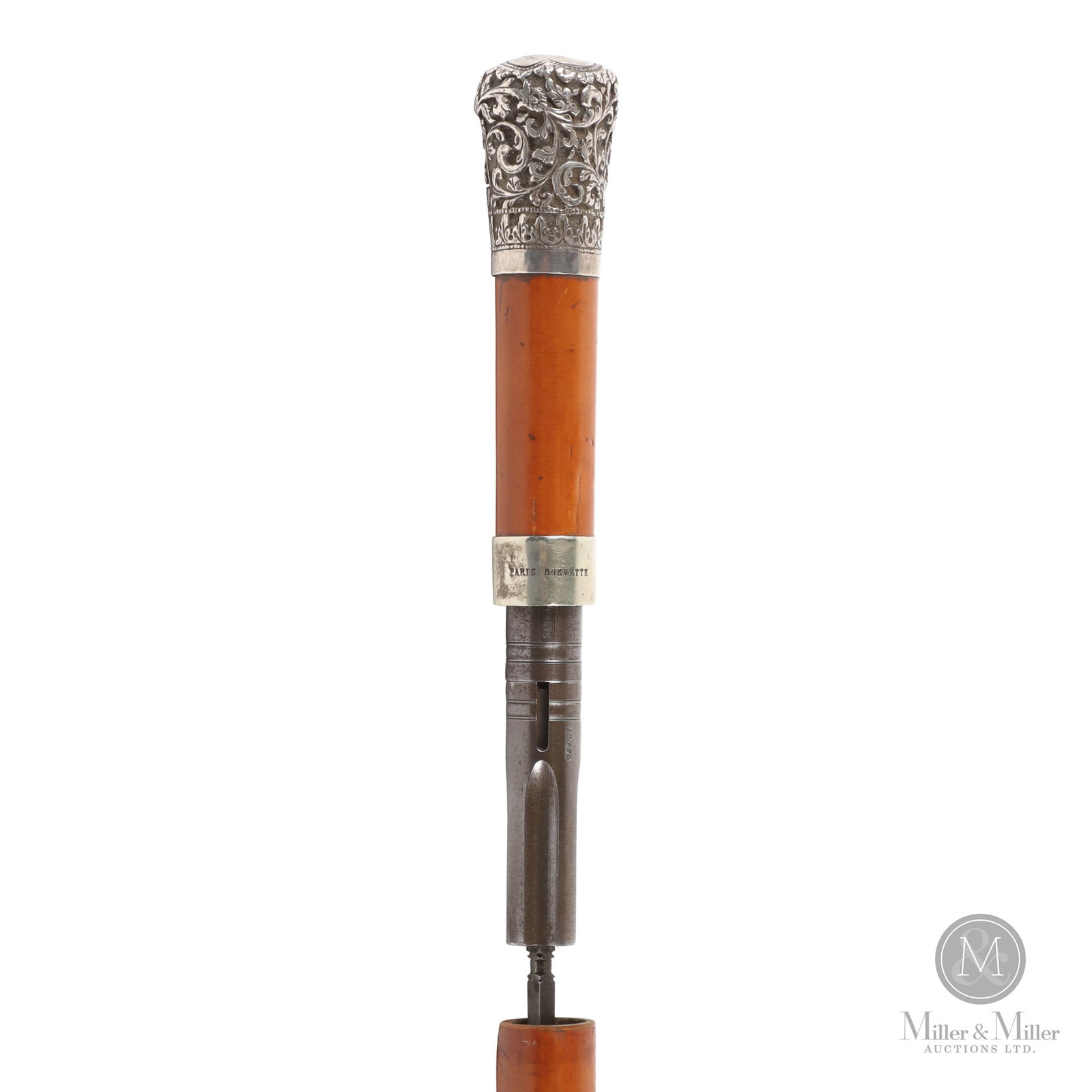 Pepperbox Pistol & Sword Gadget Walking Stick: Paris, France. Late 19th century. Steel, silver, malacca, brass. A small calibre pepperbox (four-shot) cane pistol with a spike blade. With a cast and chased silver grip and silver band marked "Paris 