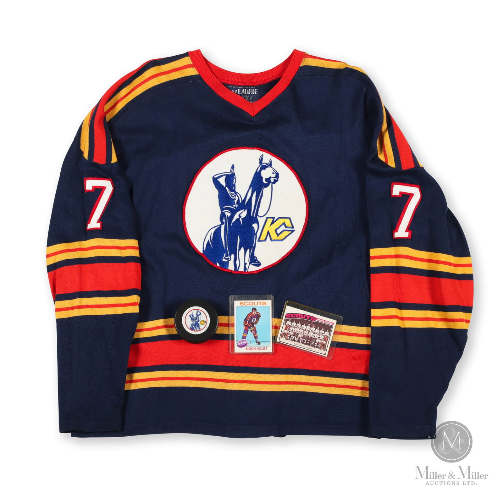 1974-76 Kansas City Scouts Simon Nolet Knit Jersey: This jersey is a striking example of the quality knit jerseys of the 1970s and represents an important time in NHL history. The Kansas City Scouts were an NHL expansion team that played two seasons fr