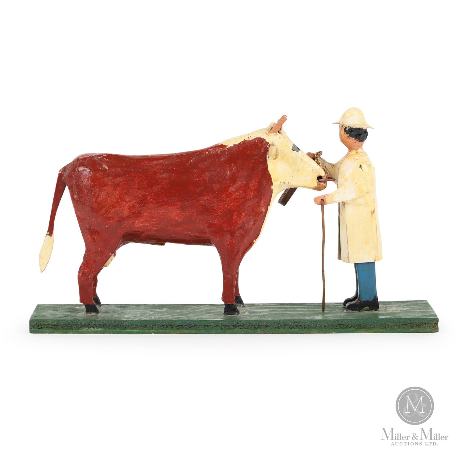 Fred Moulding Showing the Bull: Regina, Saskatchewan. Mid 1960s. Carved and painted wood. This painted wood carving by Fred Moulding (1894 - 1993) depicts a man showing a bull at an agricultural fair. Mr. Moulding has captured the m