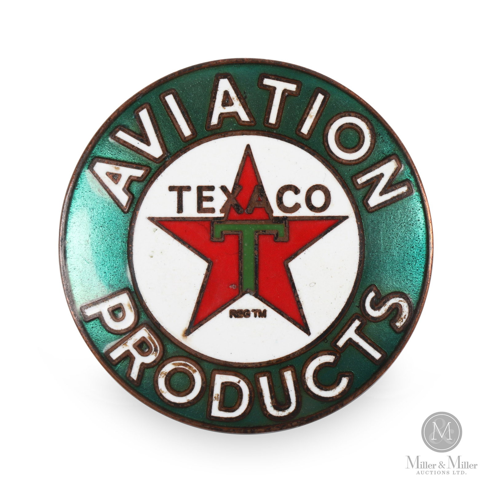 Texaco Aviation Products Enamelled Badge: American. 1930s. Enamelled copper. Rare. Marked "Miller & Son SYD" on reverse. 1.5" diameter. All items are guaranteed authentic by Miller & Miller Auctions. All purchases are eligible for delivery to