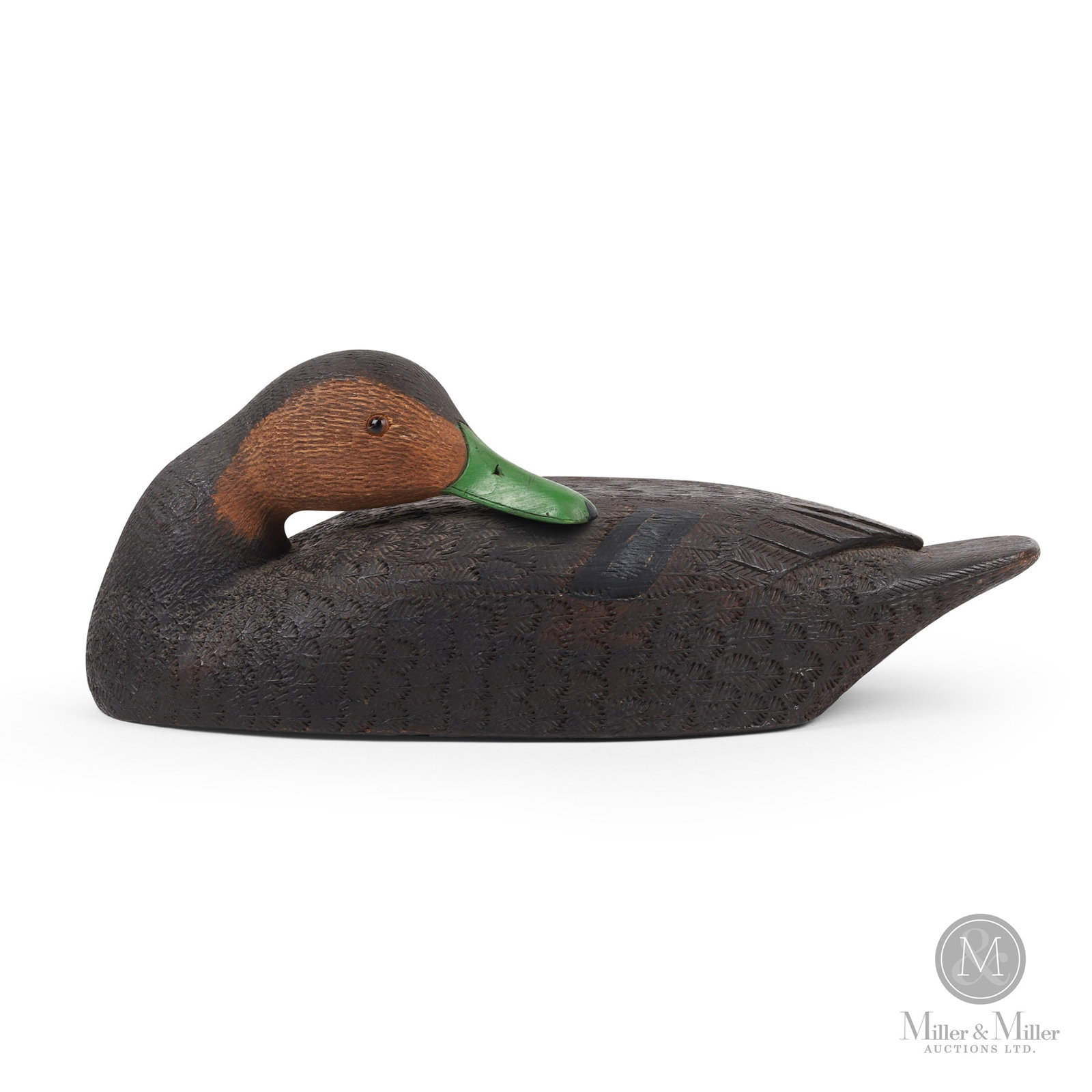 Black Duck - Amateur Savoie, Neguac New Brunswick: Neguac, New Brunswick. 1966 Painted wood. Amateur Savoie (1896-1983), a famous New Brunswick Decoy carver. Turned head sleeping form. Marked, on bottom in French. 5.5" x 16" x 6".