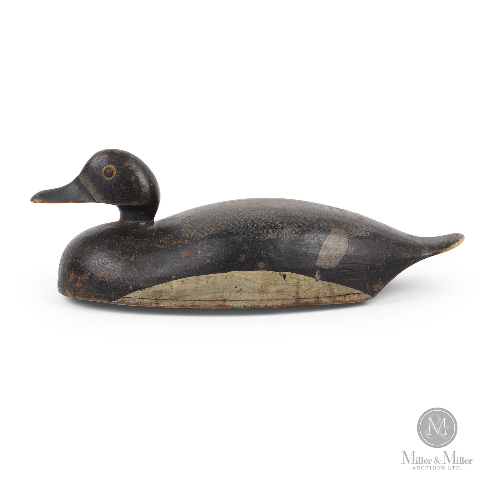 Bluebill - Norm MacDonald, West Lake Ontario: West Lake, Ontario. First quarter 20th century. Painted wood. Norman Hyatt MacDonald (1895-1986), from MacDonalds personal hunting rig. Marked, "NMcD", on bottom. 4.5" x 13.25" x 5.5".