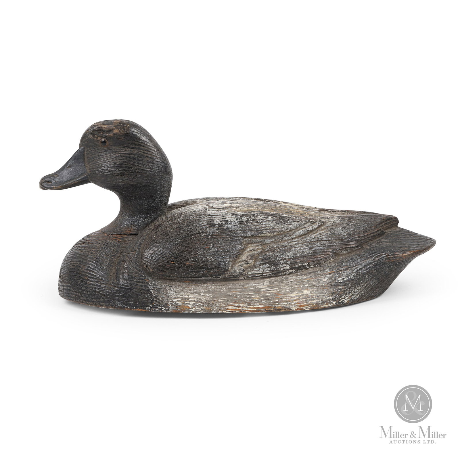 Bluebill Drake - Bud Tully, Peterborough Ontario: Peterborough, Ontario. Late second quarter 20th century. Painted wood. Bud Tully (1918-1973). Features his desirable carving style with the detailed wingtips and tail. Paper tage. Not maker marked. 5.