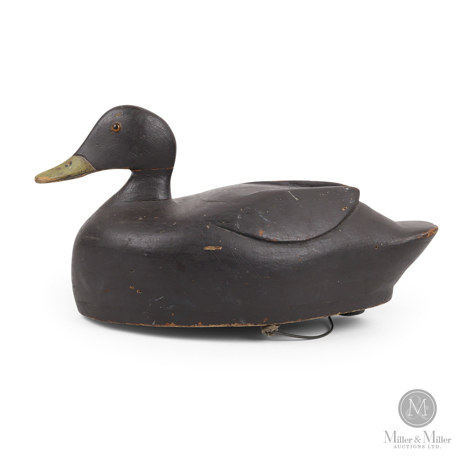 Black Duck - Bill Lockhart, Brockville Ontario: Brockville, Ontario. Late second quarter 20th century. Painted wood. Pictured in "Decoys of the Thousand Islands" (Jim Stewart / Larry Lunman), Page 146. 8.5" x 14.5" x 7".