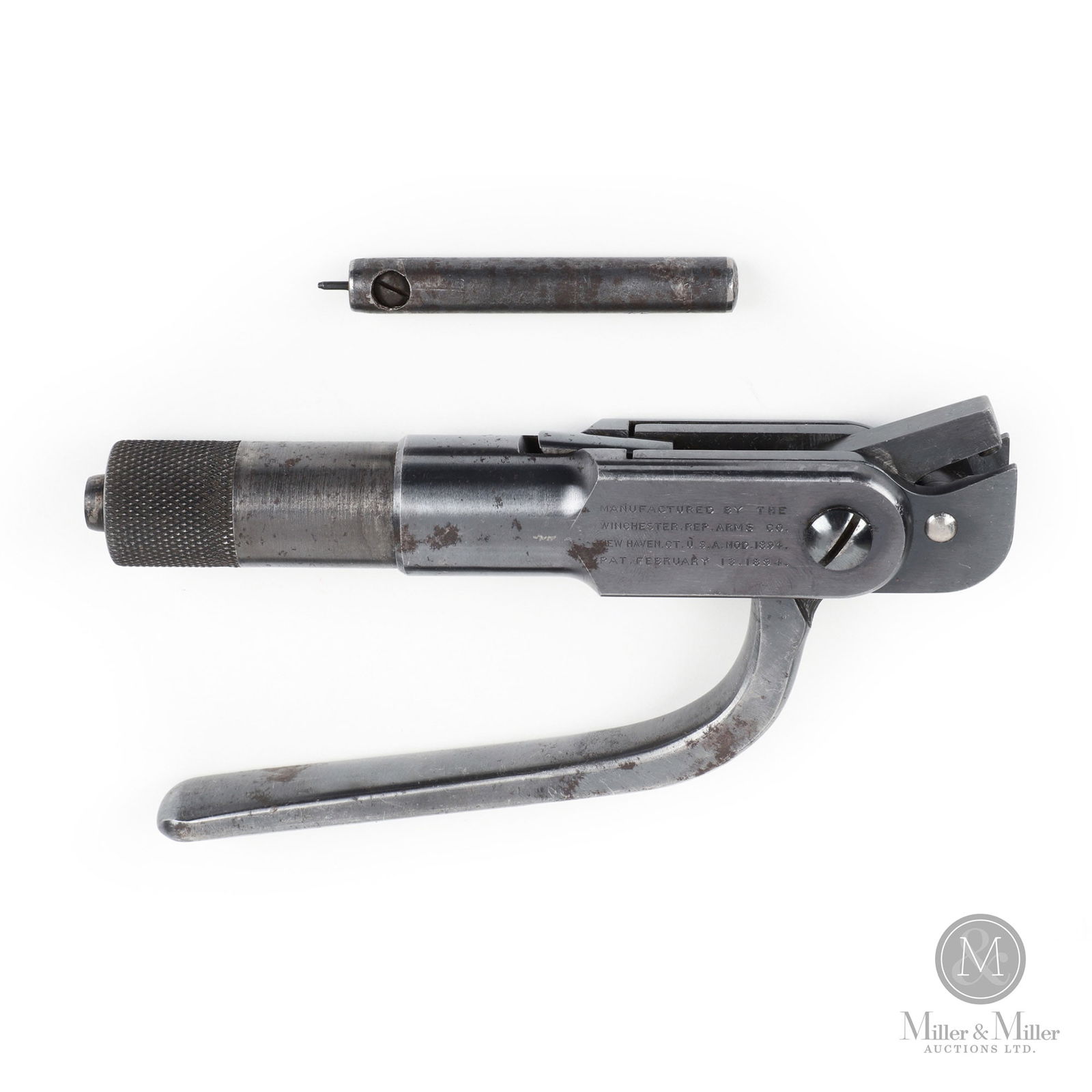 Vintage Winchester Stamped Ammunition Lever Reloading Tool: American. For reloading 45 calibre Government rifle cartridges as stamped on the die section that comes with its primer extractor plug. Marked, on body of tool. 7.25" x 3.5" x 1". From the G. Wayne Co