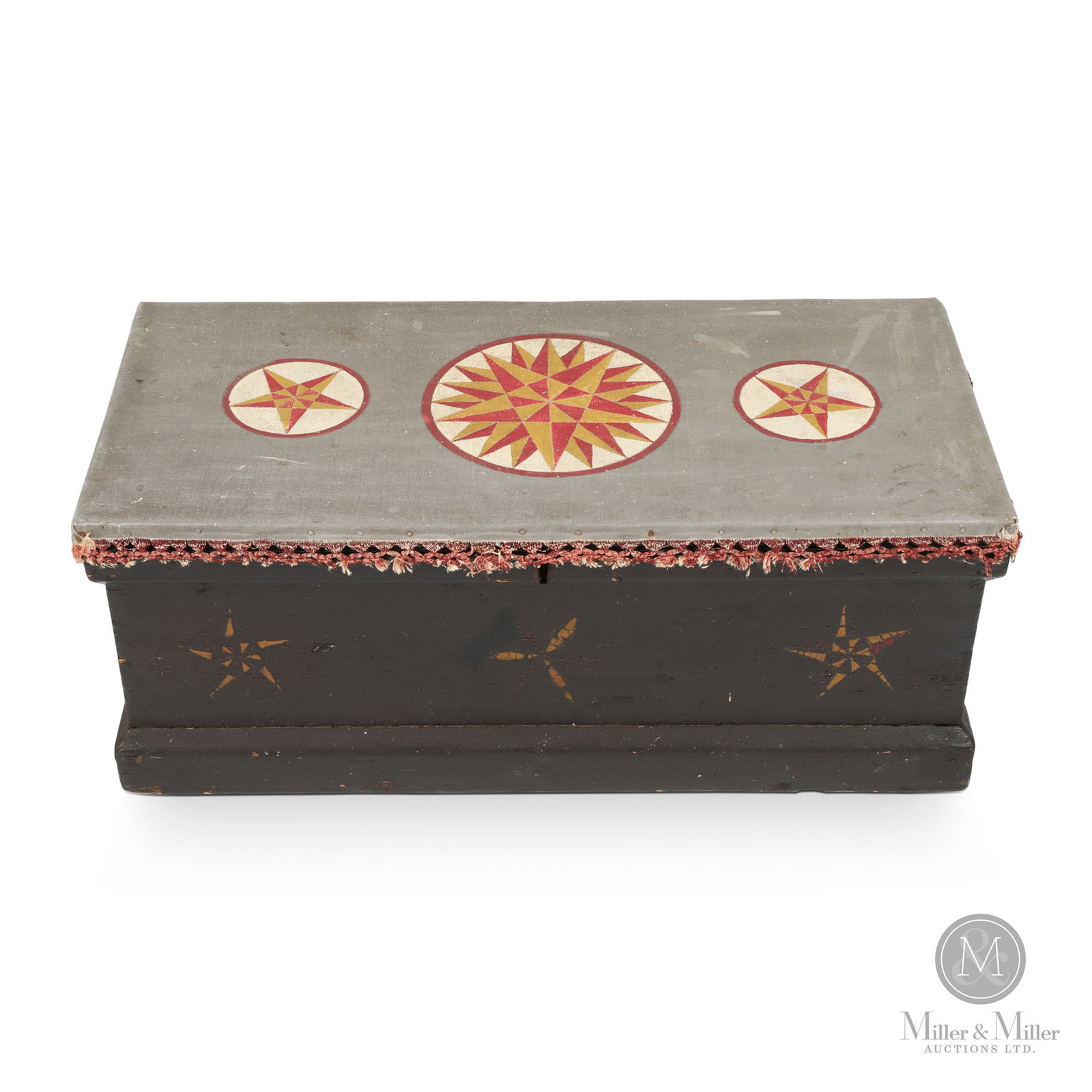 Sea Chest With Sailcloth Top: A mid-size sea chest with a decorated canvas-covered lid, original becket handles, and original paint with two swirling stars flanking a pinwheel on the front. The sail canvas top has an original tatt