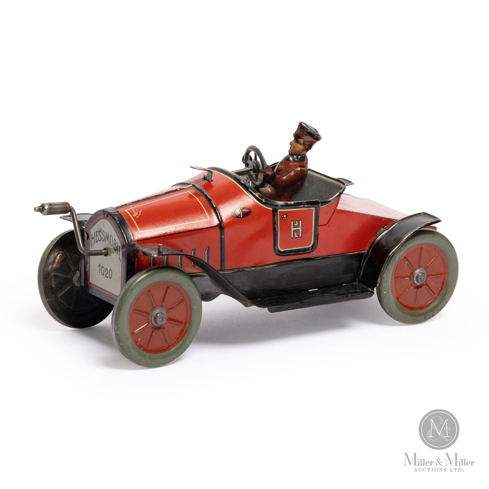 Hessmobil Model #1020 Touring Car by J.L. Hess: German. 1910-1920. This toy was manufactured by Johann Leonard Hess (JLH) in Nuremberg, Germany. Hess was one of the oldest Nuremberg toymakers, founded in 1826. The company was known for producing ti