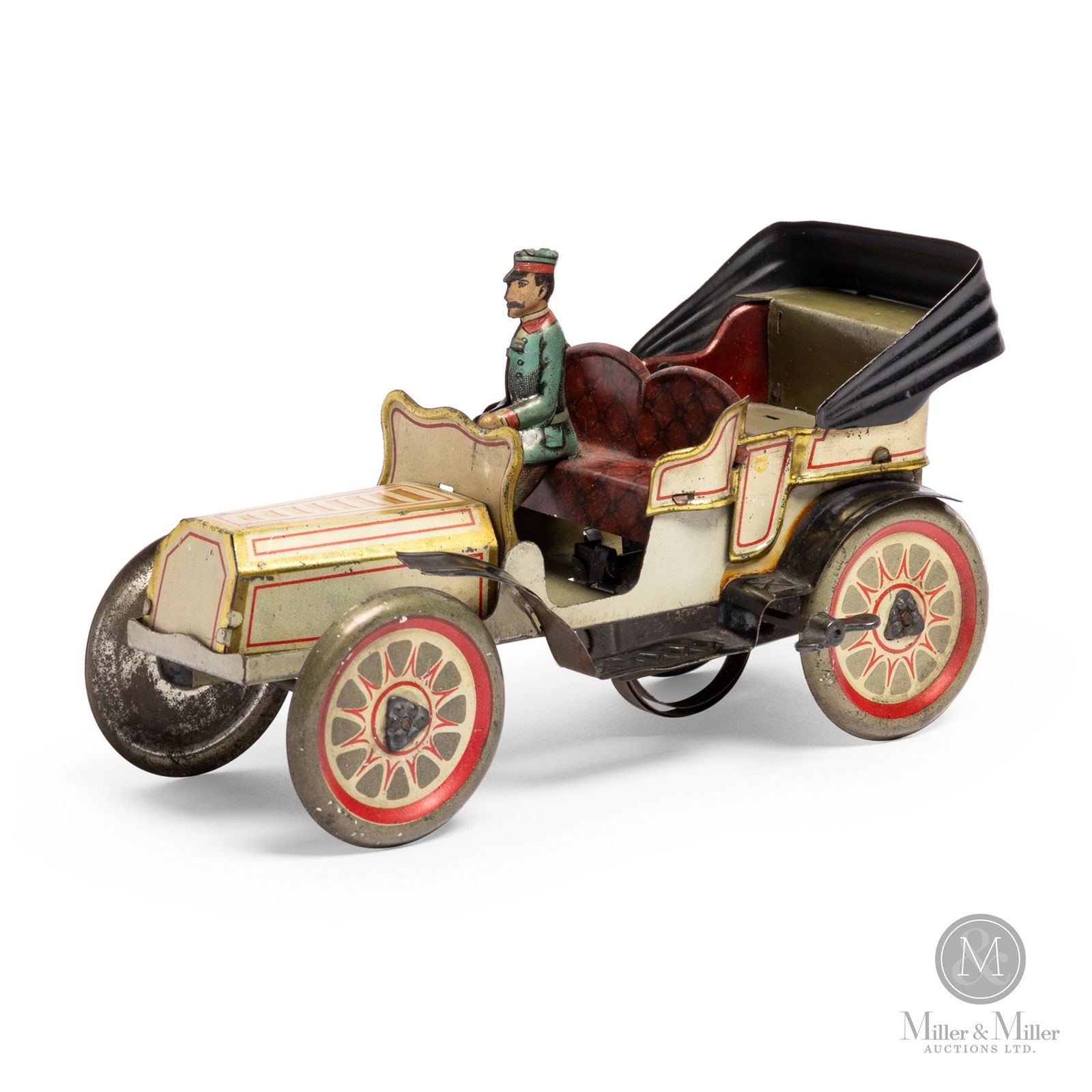 Open Tourer Toy Car By J.L. Hess: German. C. 1910. This toy was manufactured by Johann Leonard Hess (JLH) in Nuremberg, Germany. Hess was one of the oldest Nuremberg toymakers, founded in 1826. The company was one of the pioneer users