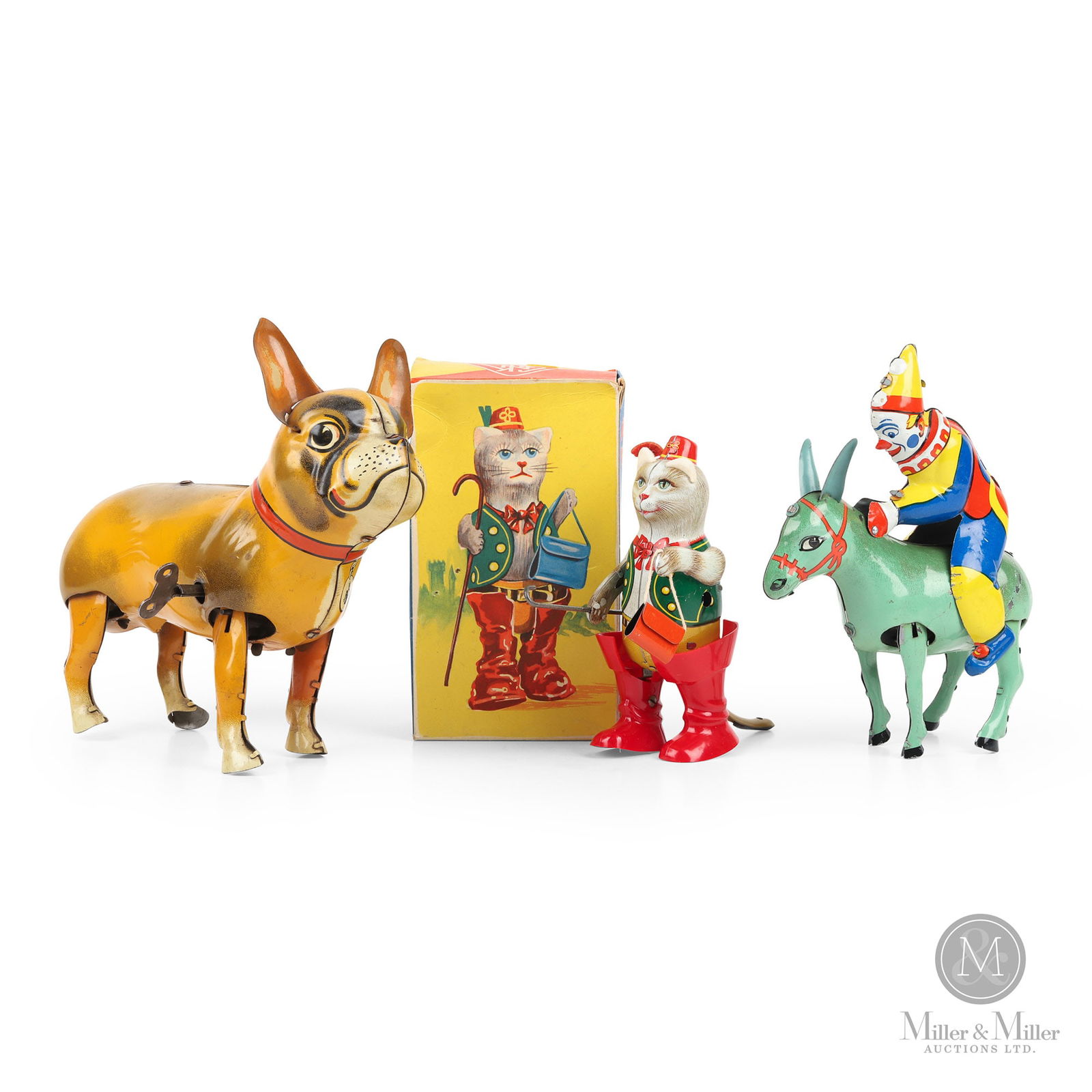 Wind Up Walking Toys: Western German. Puss In Boots and Clown on Donkey: 1940s. French bulldog: 1945-1952. Puss In Boots toy was made by Georg Kohler of Nuremberg, Germany (GKN), a game and metal goods factory founded in 1