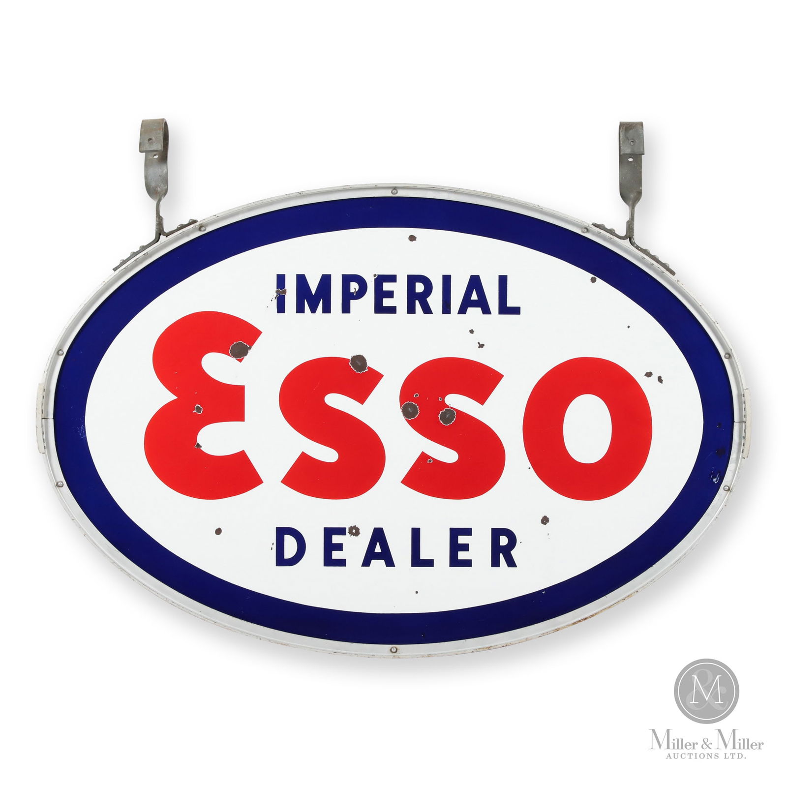 Imperial Esso Service Station Sign: Canadian. 1950s. Double-sided porcelain (DSP). Bilingual. 46.5" x 60" (bracket on). Authenticated by The Authentication Company (TAC #401061). All items are guaranteed authentic by Miller & Miller Auc