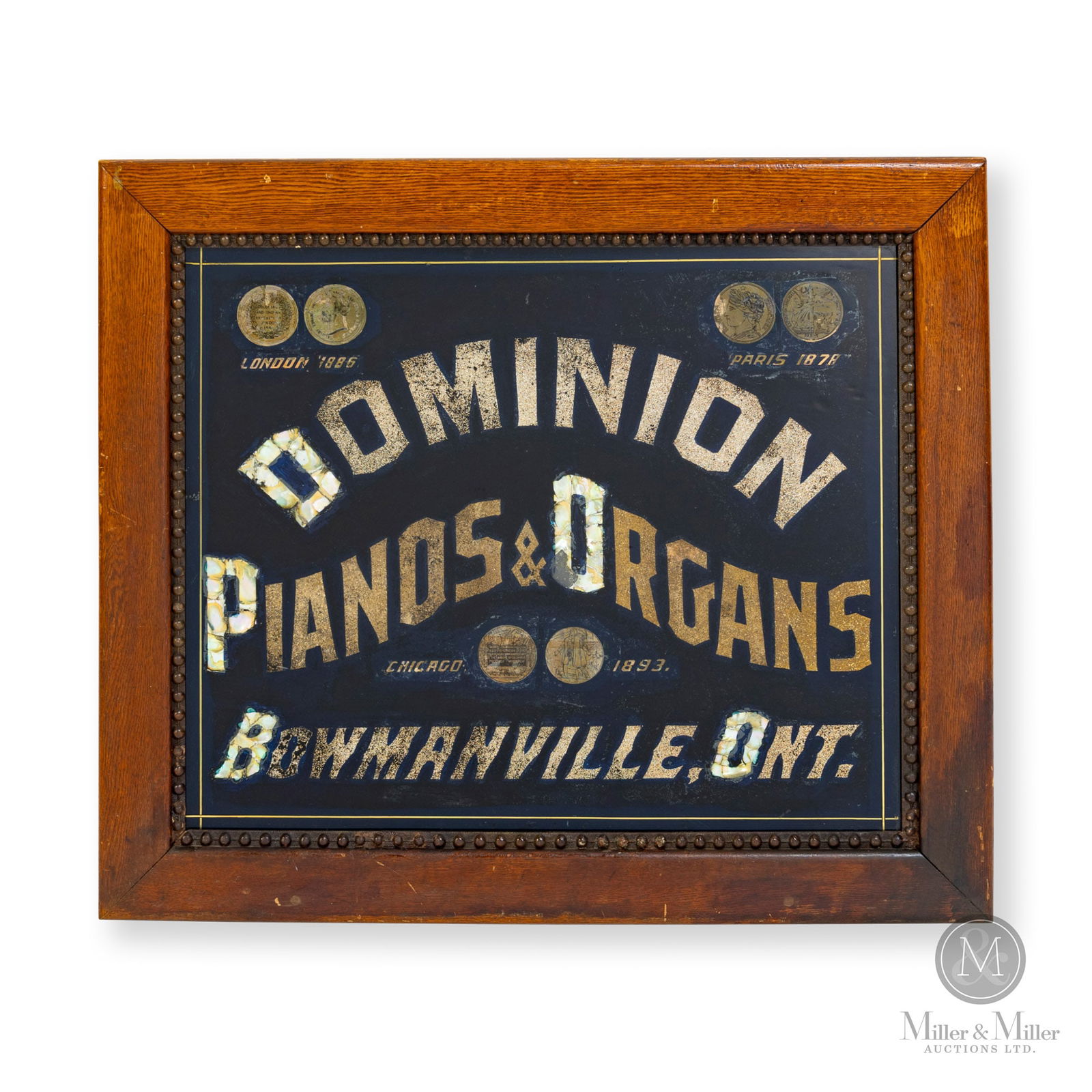 Dominion Pianos & Organs Framed Reverse Glass Sign: Bowmanville, Ontario. 1880s. Reverse on glass (ROG). Founded in Bowmanville, Ontario, in 1870, Dominion became one of Canada’s leading manufacturers of reed organs and upright pianos. The compan