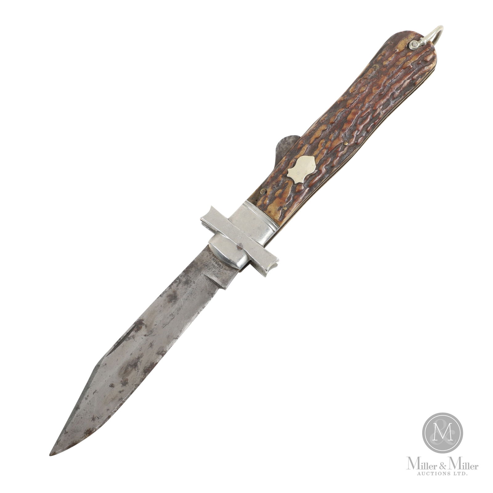 H. Boker & Co. Pocket Knife: German. C. 1880-1890. Antique. H. Boker & Co. Pocket Knife. Folding blade measuring approximately 4.5â€. Stag grips. Marked with the manufacturers early tree logo. Approx. 9.25" x 1"