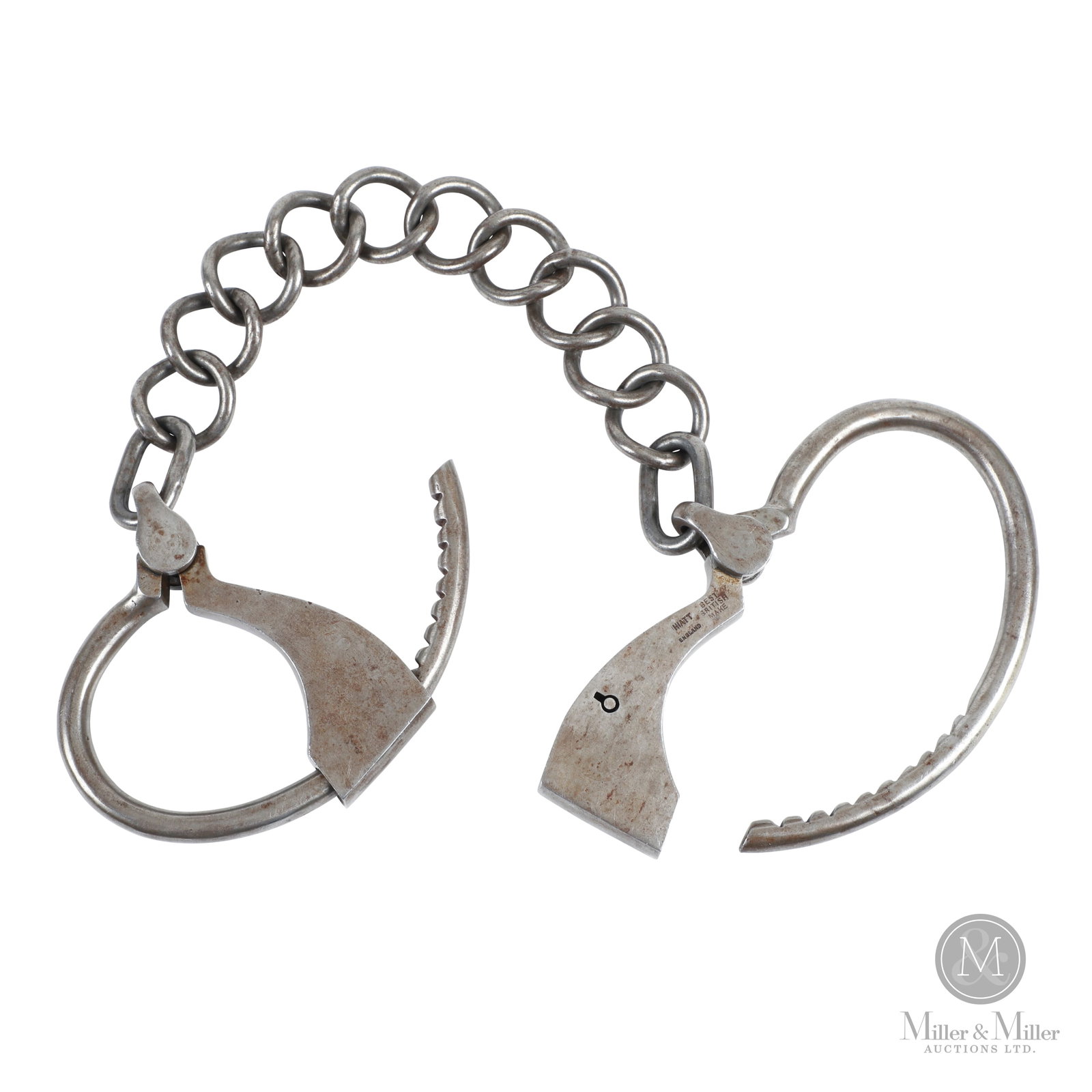 North West Mounted Police Leg Irons: British. C. 1875-1880. Non-Restricted. North West Mounted Police Leg Irons. British made by HIATT. No key. Originally from the NWMP detachment in Regina, Saskatchewan. Circa 1875-1880. Collection of A