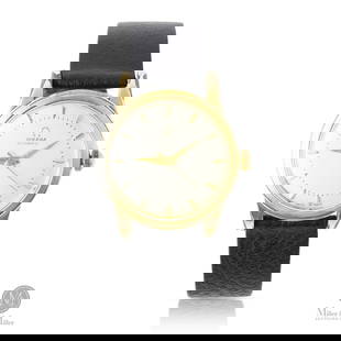 Omega, Ref. 2677-8SC, Seamaster Automatic: Swiss. Gold-capped case, steel back. This Omega Seamaster bumper automatic is a classic example of Omega's early post-war automatic technology. Two-tone silver dial. Applied indices and sharp