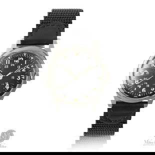 Benrus, Vietnam-Era U.S Military Contract Watch: American. Gunmetal case. A Benrus military wristwatch from the Vietnam War era. Features a black matte dial with 24-hour markings. Produced under U.S. military specification MIL-W-3818. Issued May