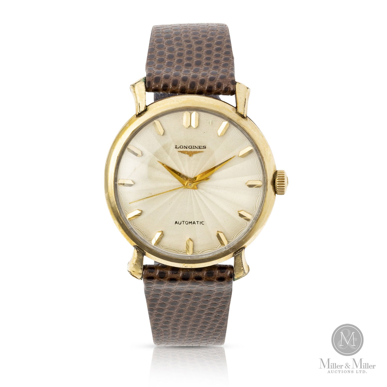 Longines, Ref, 2369-4 Automatic with Box: Swiss. 10K gold filled. The Longines Starburst is a striking example. A radiant dial finish, with automatic movement. Presented with its original box. 34 mm. From the Alexander James Black Collection.