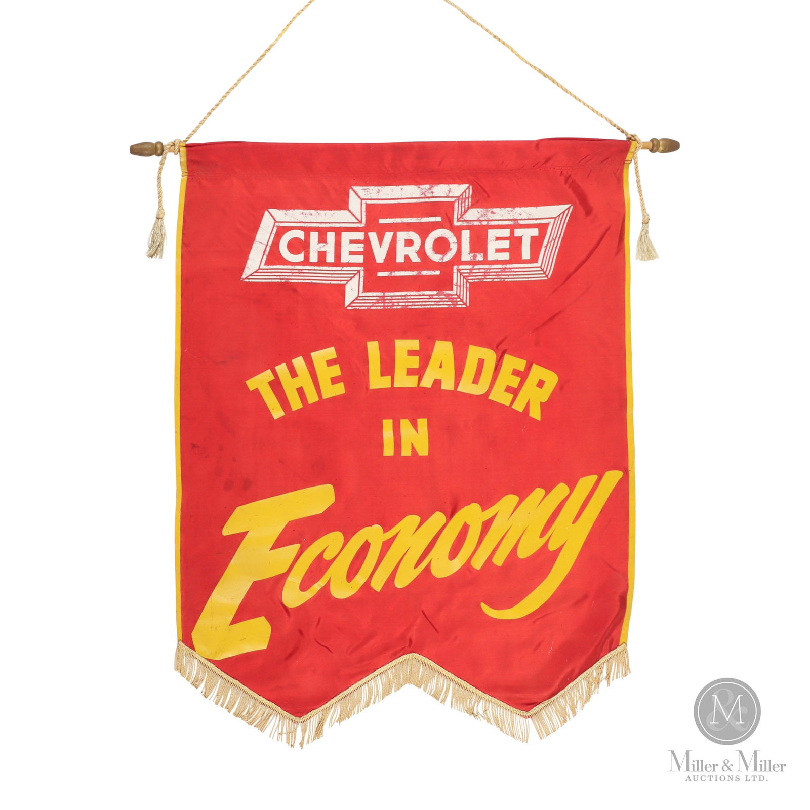 Chevrolet "The Leader In Economy" Dealer Banner: American. 1940s. Screened satin. 35" x 33.5" x 1". From the Jason Patzer Collection.