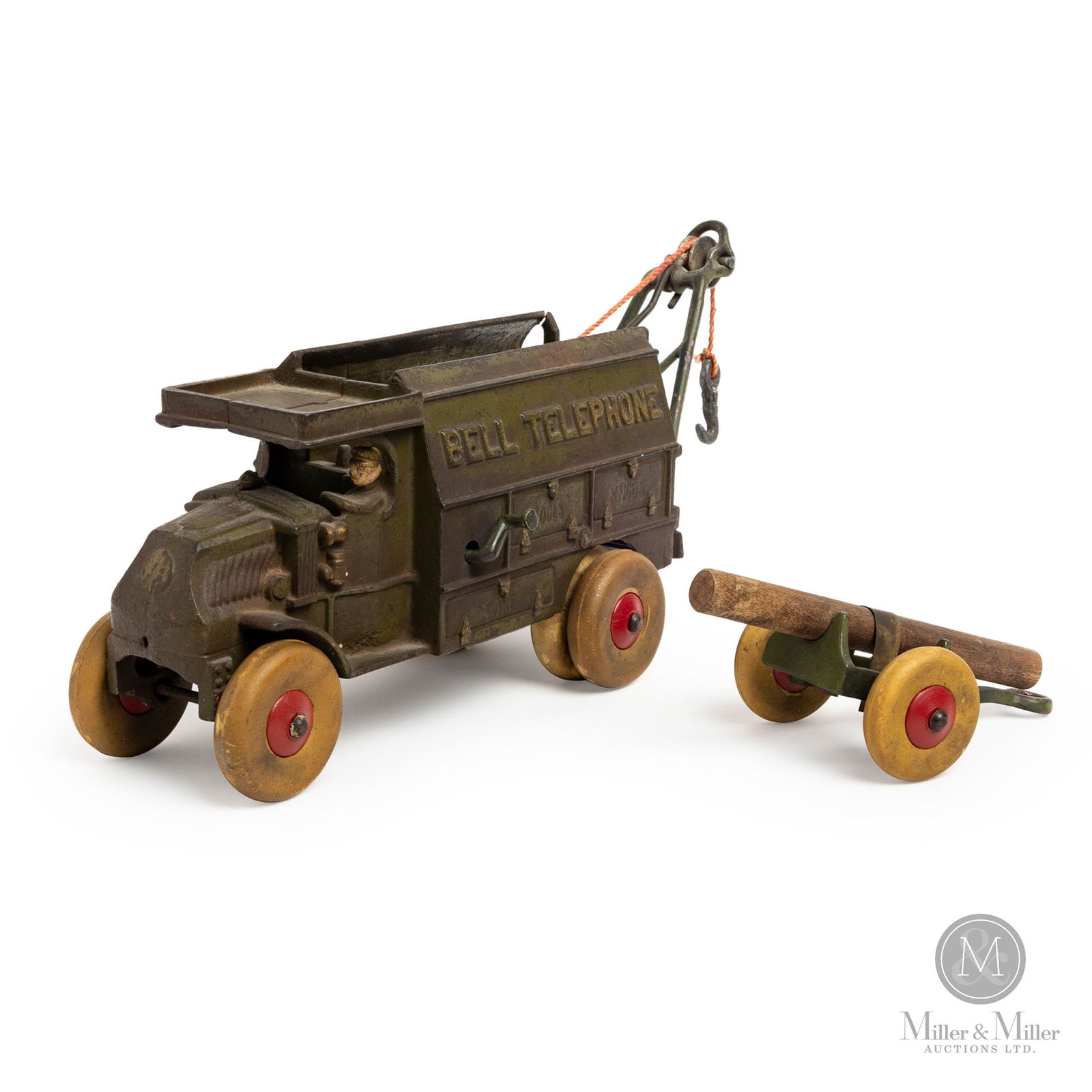 Hubley Bell Telephone Truck With Pole Trailer: American. 1930s. Cast iron. The Hubley Manufacturing Company was founded in 1894 in Pennsylvania. The company's early beginnings focused on the production of cast-iron toys, including doorstops, booke
